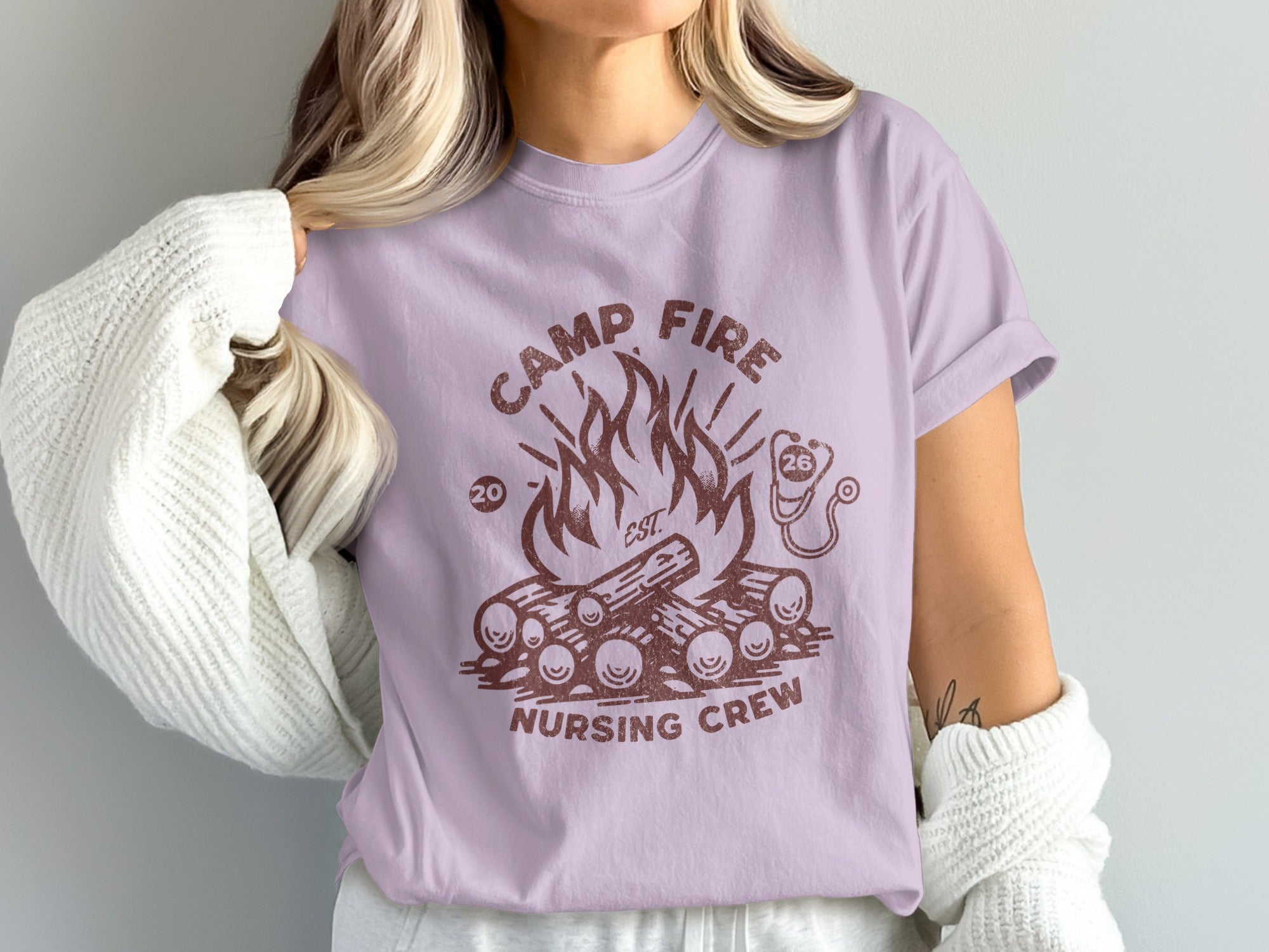 Camp Fire Nursing Crew graphic tee with campfire and stethoscope.
