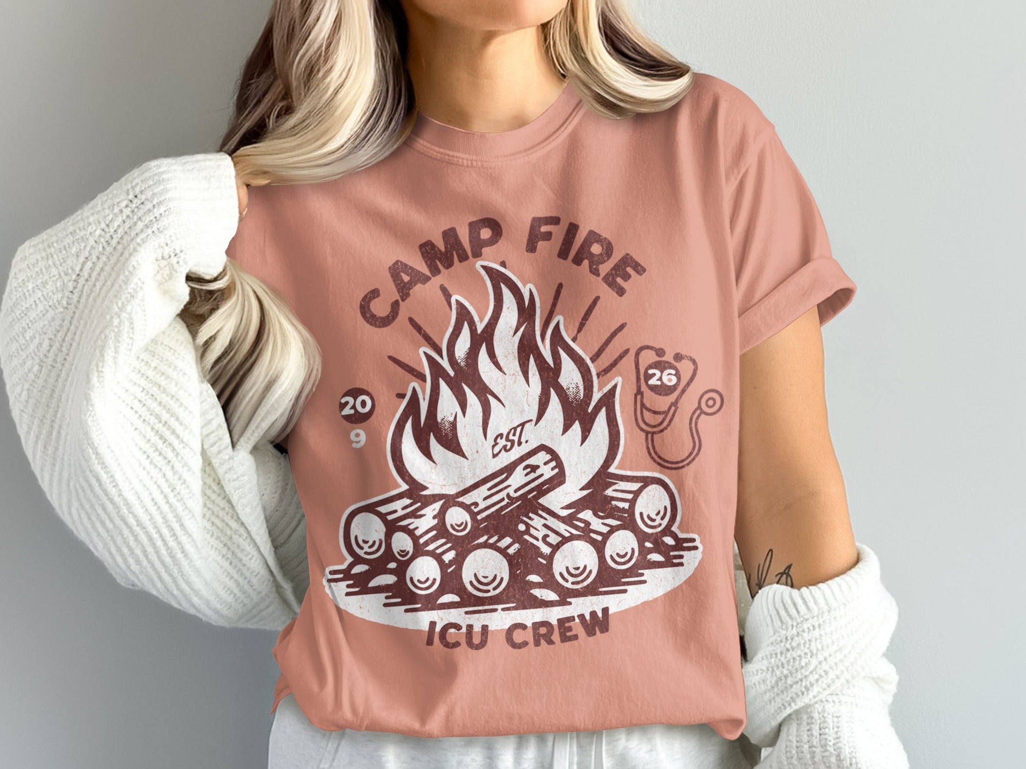 T-shirt graphic with campfire and "Camp Fire ICU Crew" text.