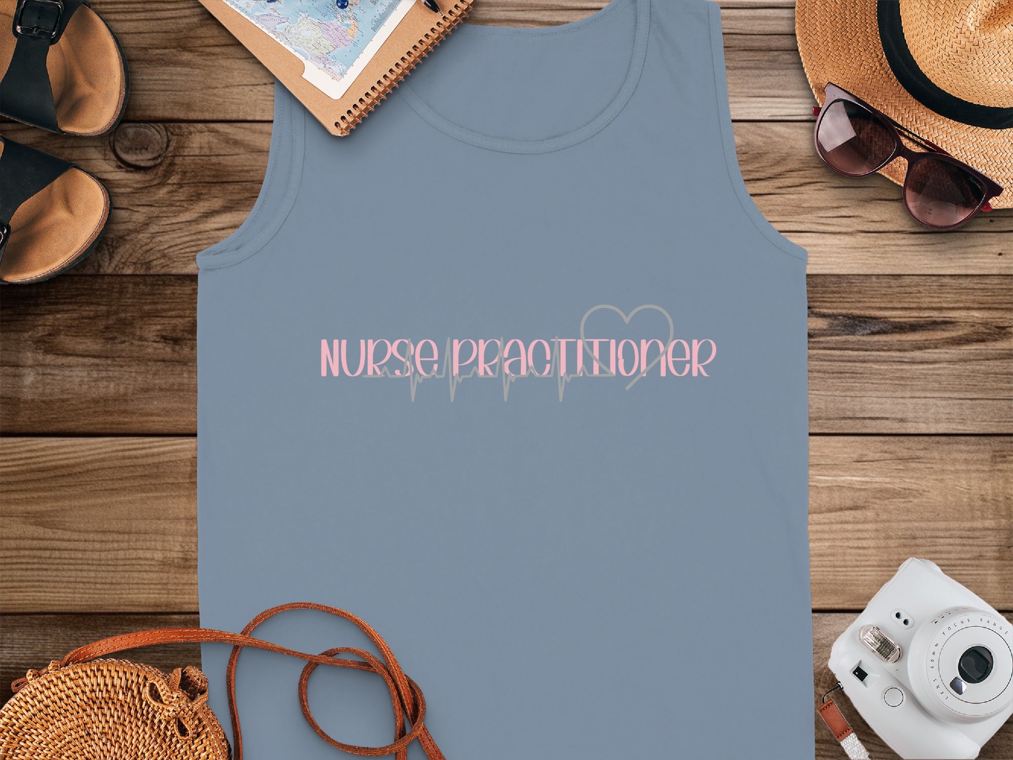 Nurse Practitioner tank top with pink stethoscope graphic.
