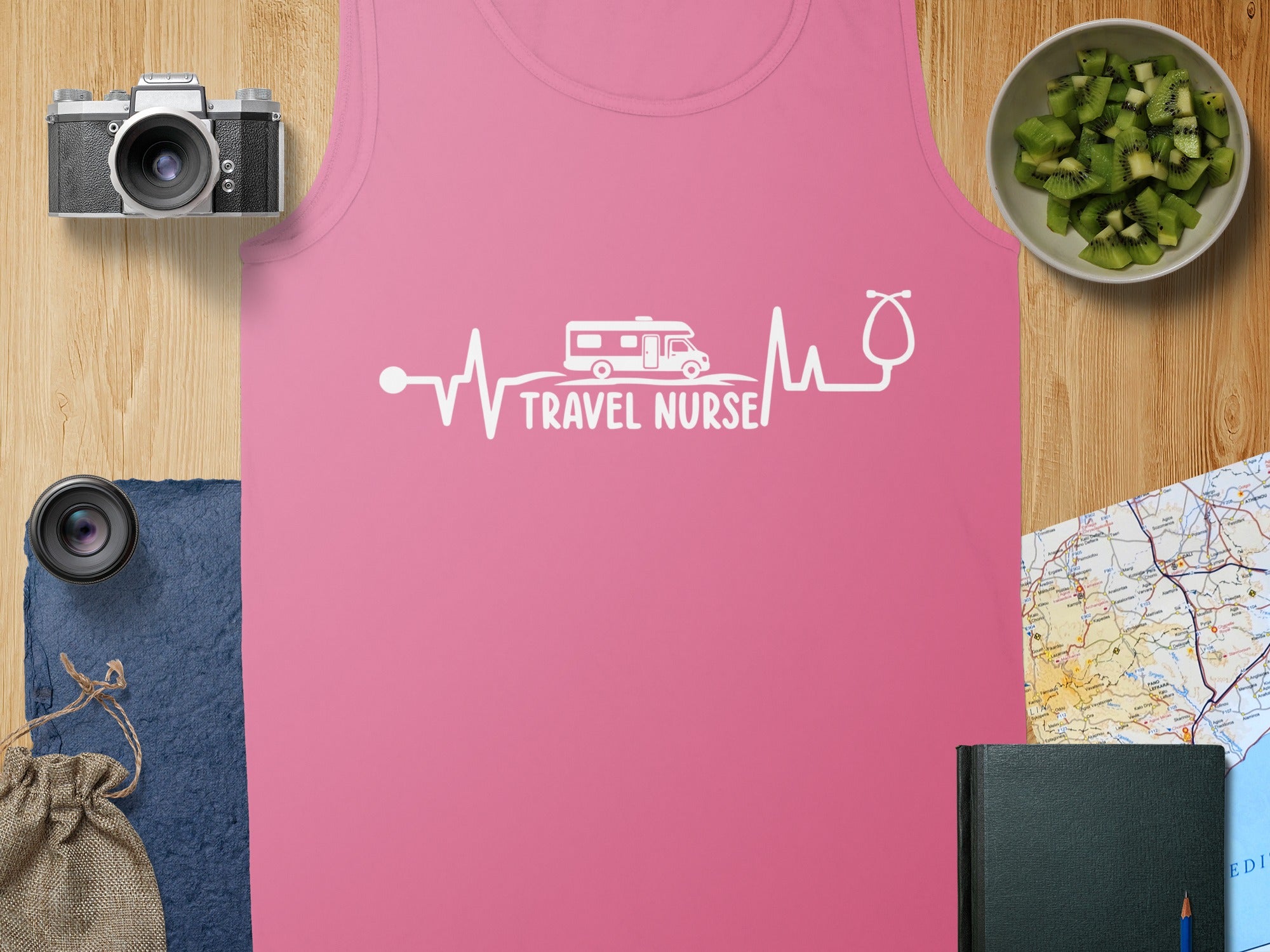 Pink tank top with a "Travel Nurse" electrocardiogram design.