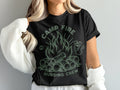 Black t-shirt with campfire and "Camp Fire Nursing Crew" text.