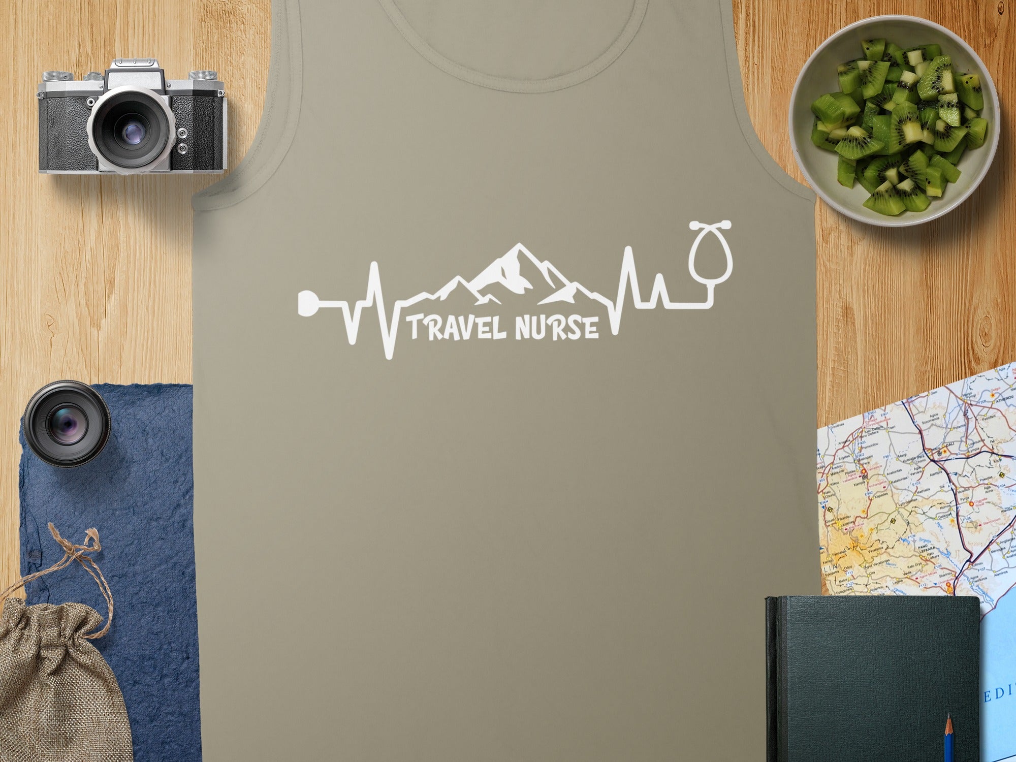 Tank top with "Travel Nurse" electrocardiogram design and travel items.