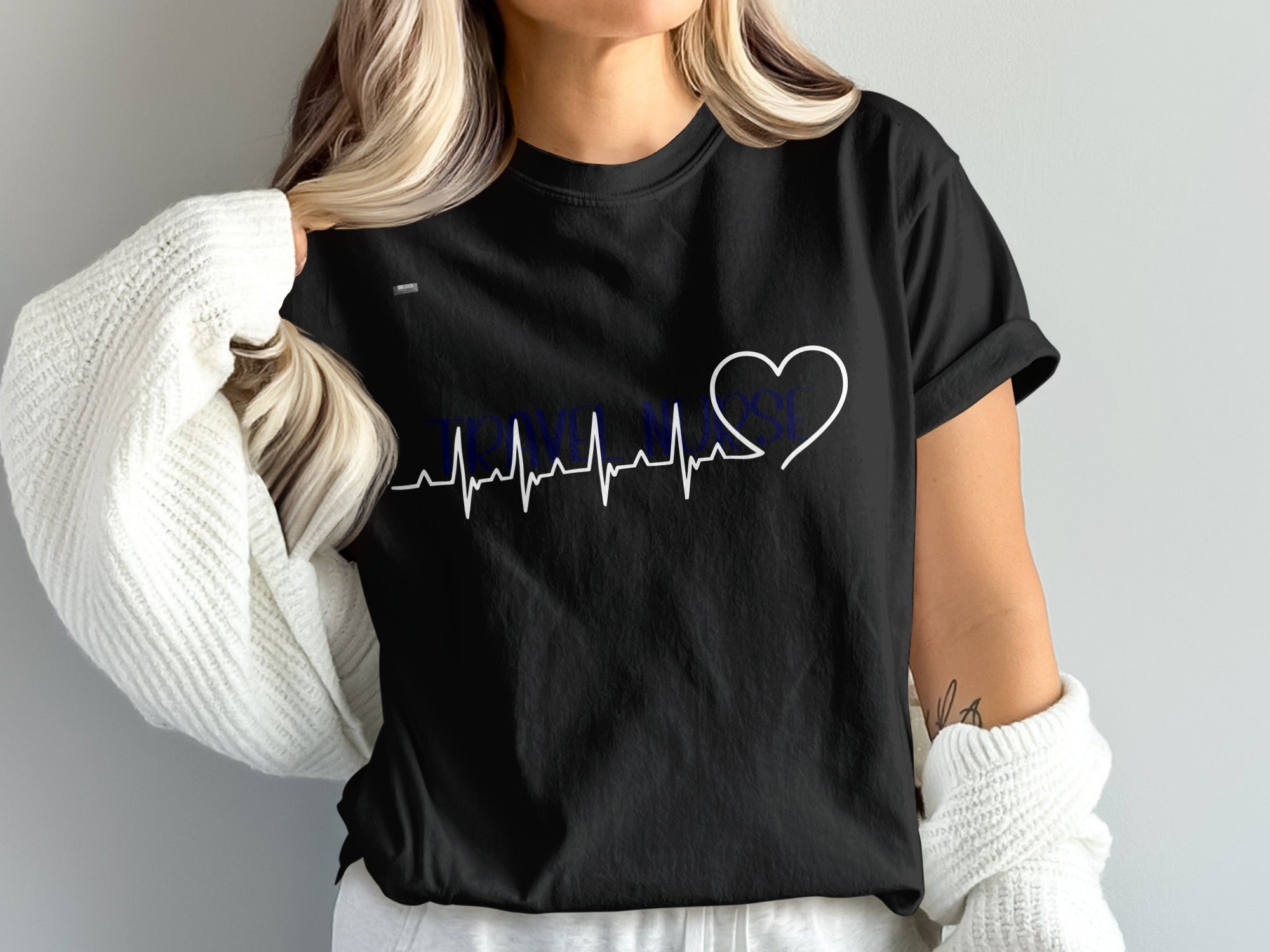 Black t-shirt with "TENNESSEE LOVE" text and a heartbeat graphic.