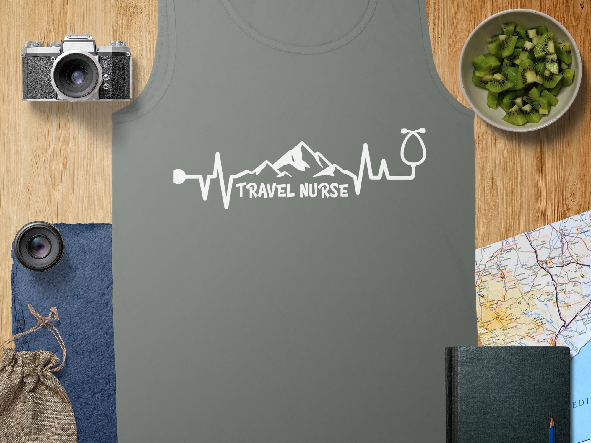 Gray tank top with "TRAVEL NURSE" in a heartbeat and stethoscope design.