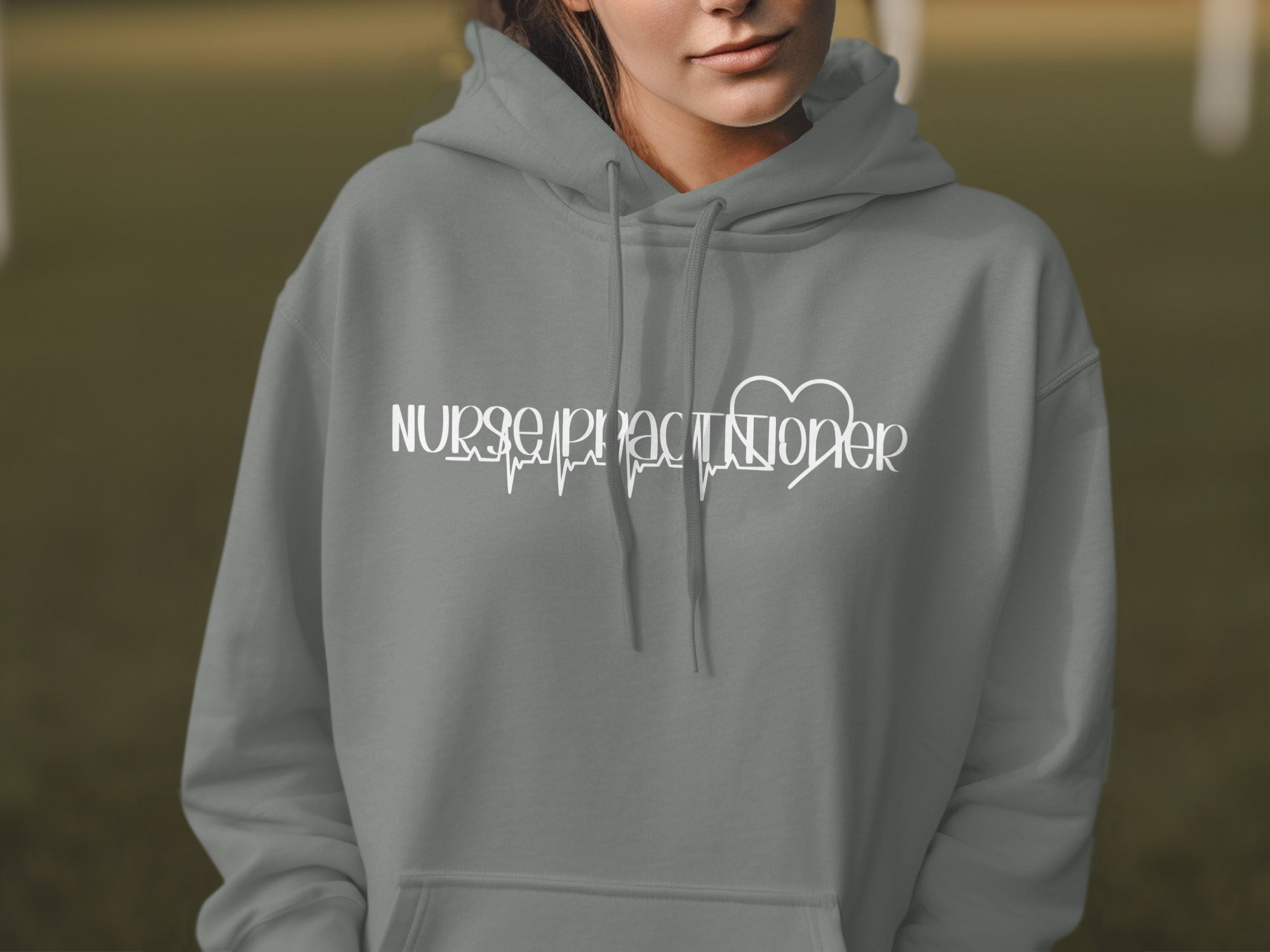 Gray hoodie with "Nurse Practitioner" text and heartbeat line.