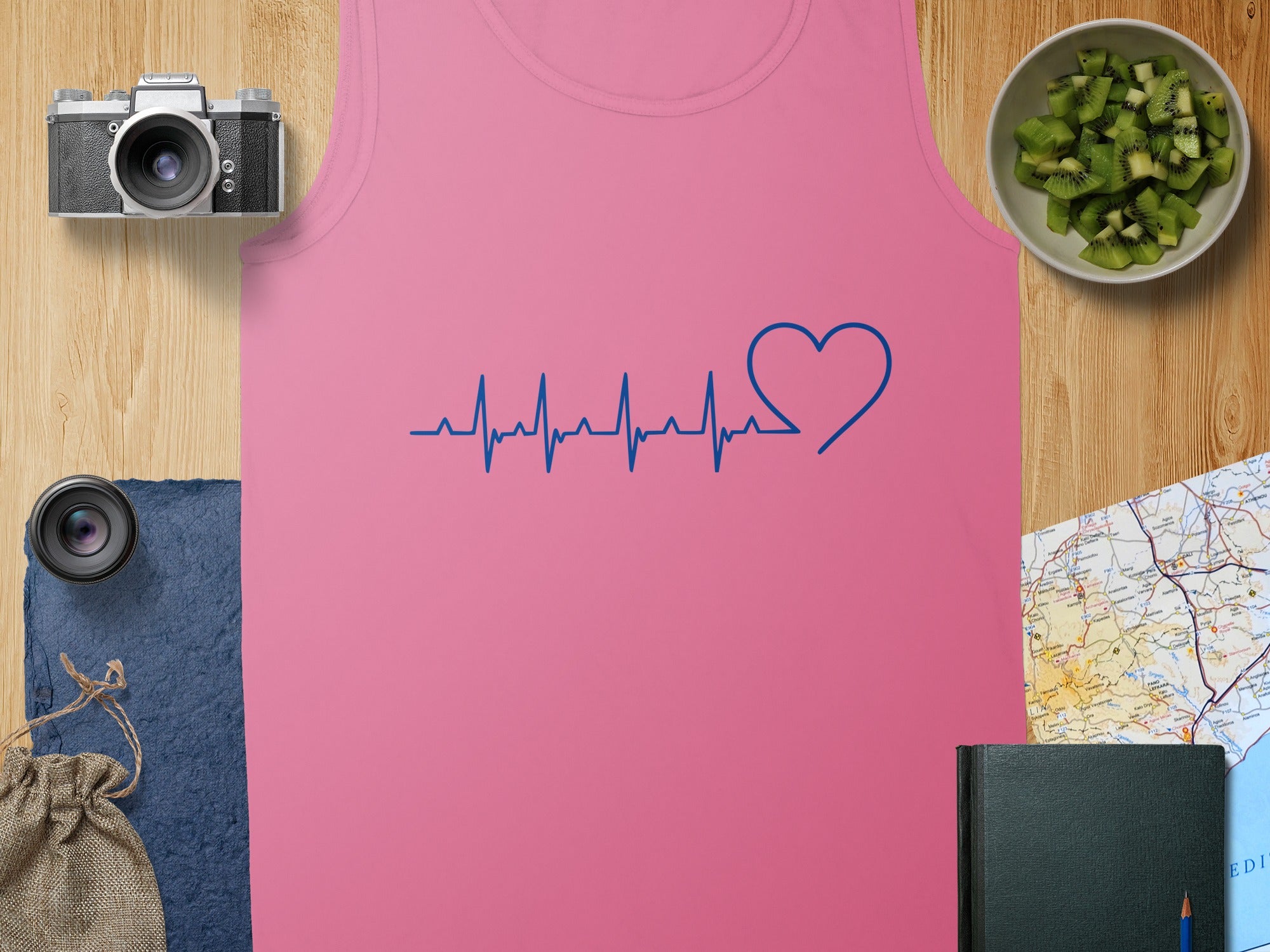 Pink tank top with blue heart rate line and heart graphic.