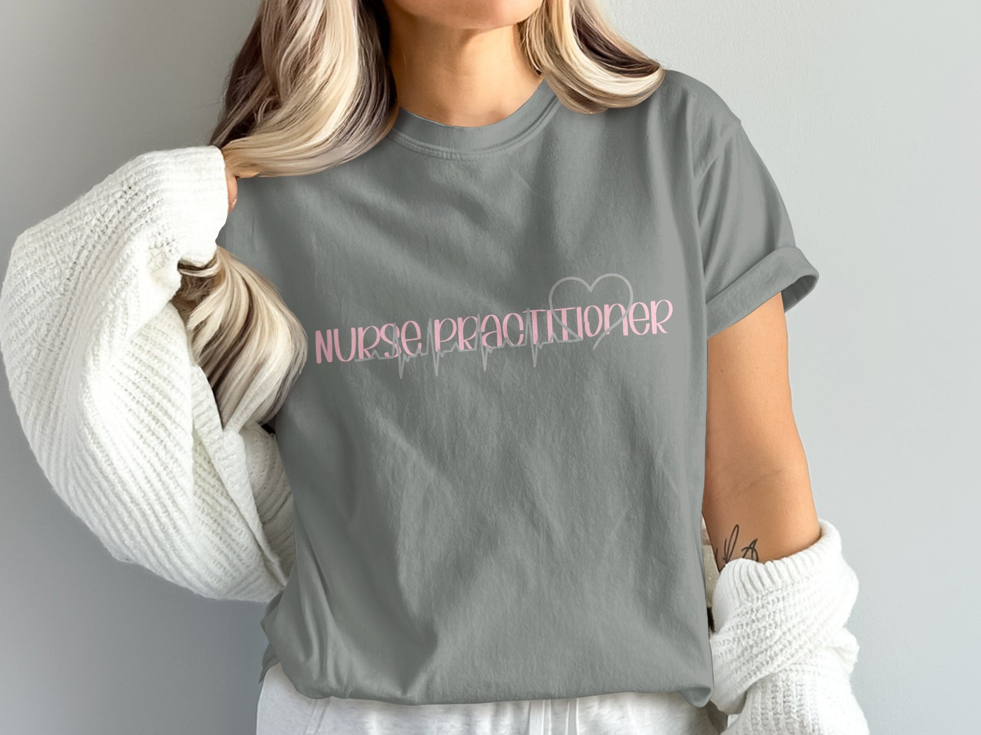 Grey t-shirt with "Nurse Practitioner" and a heart-shaped EKG design.