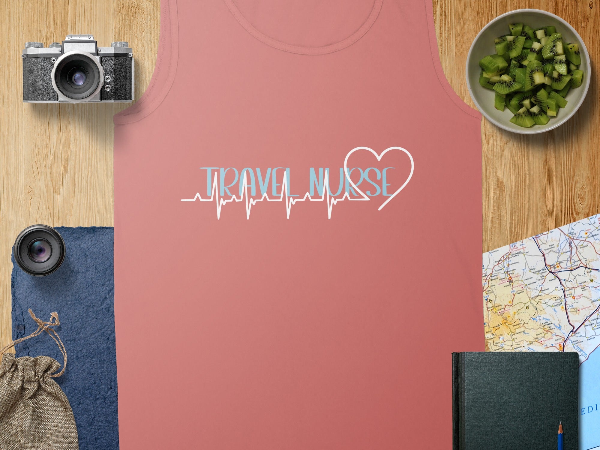 Pink tank top with "Travel Nurse" and heart heartbeat graphic.