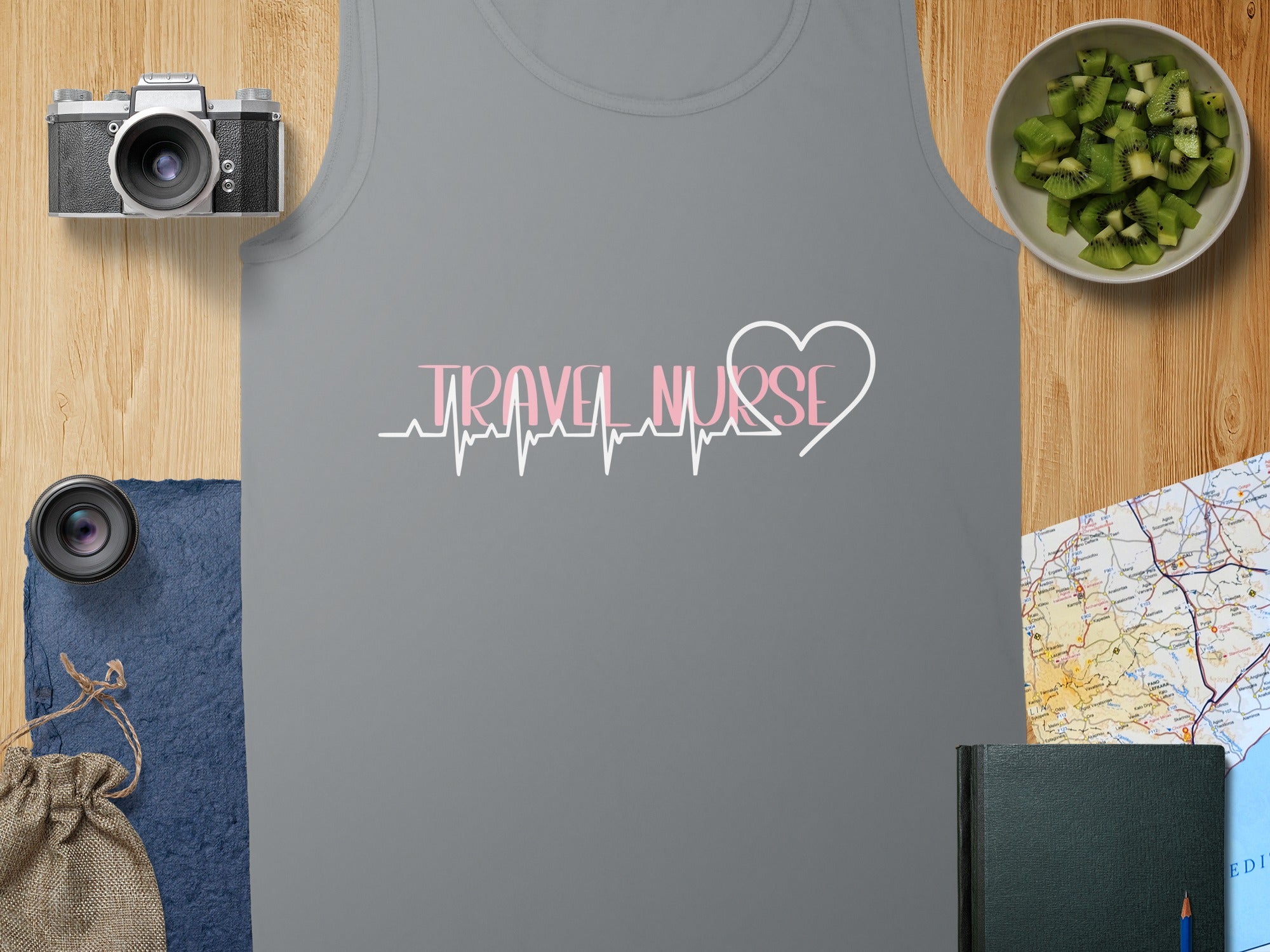 Gray tank top with "TRAVEL NURSE" text and a heart rate monitor line.