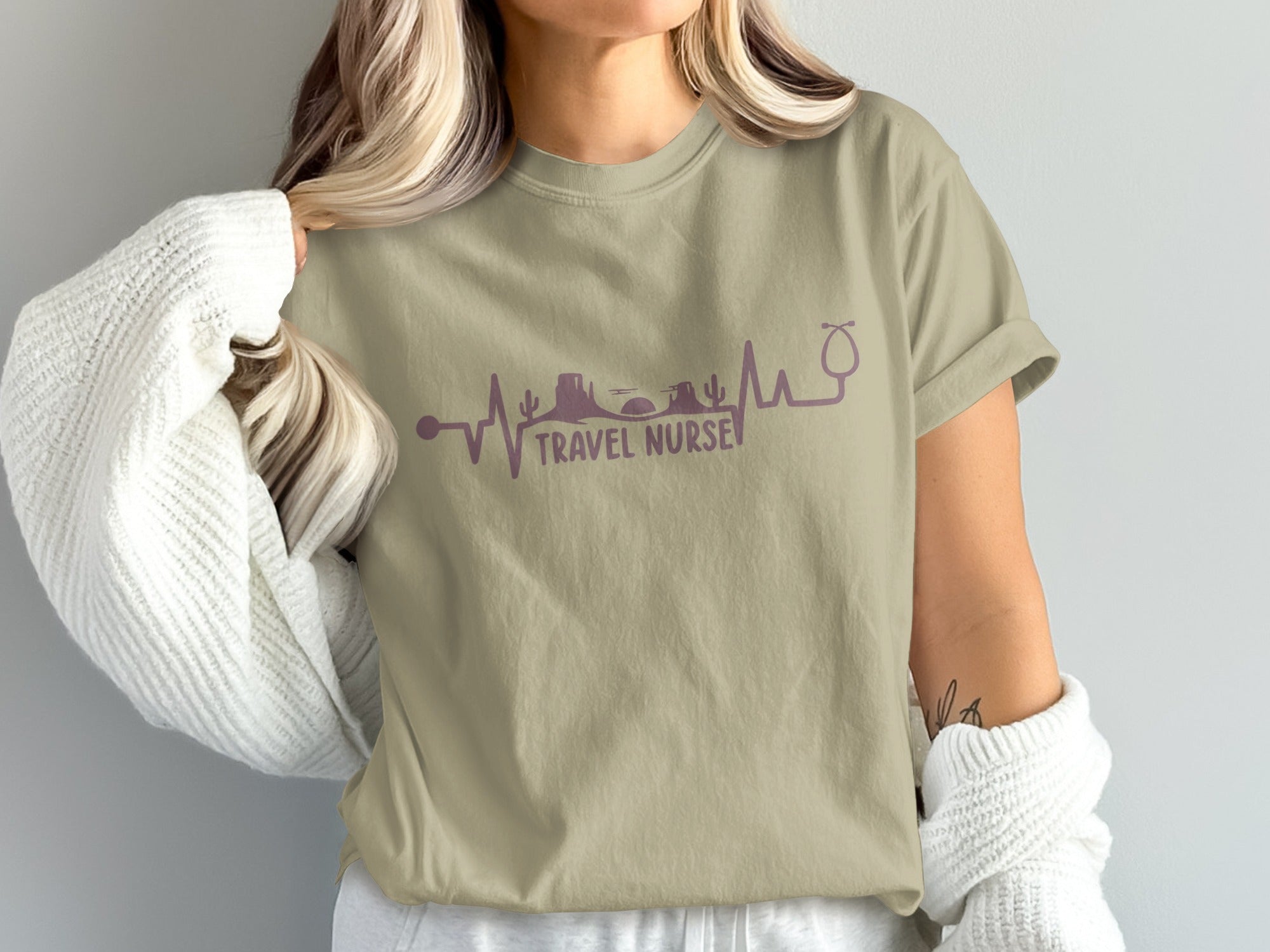 T-shirt with desert landscape and stethoscope in heart rhythm design.