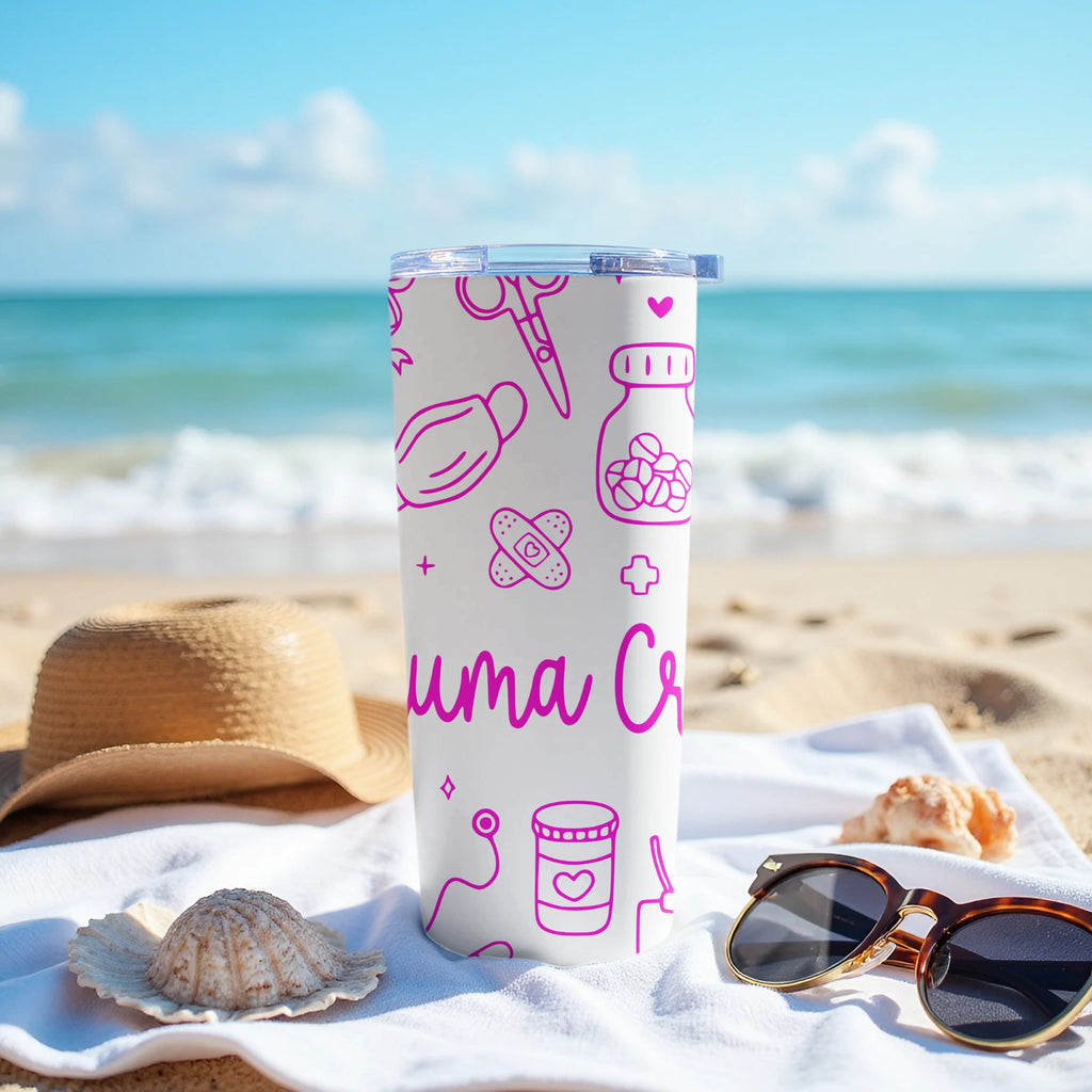 White tumbler with medical icons and pink text on a beach towel.