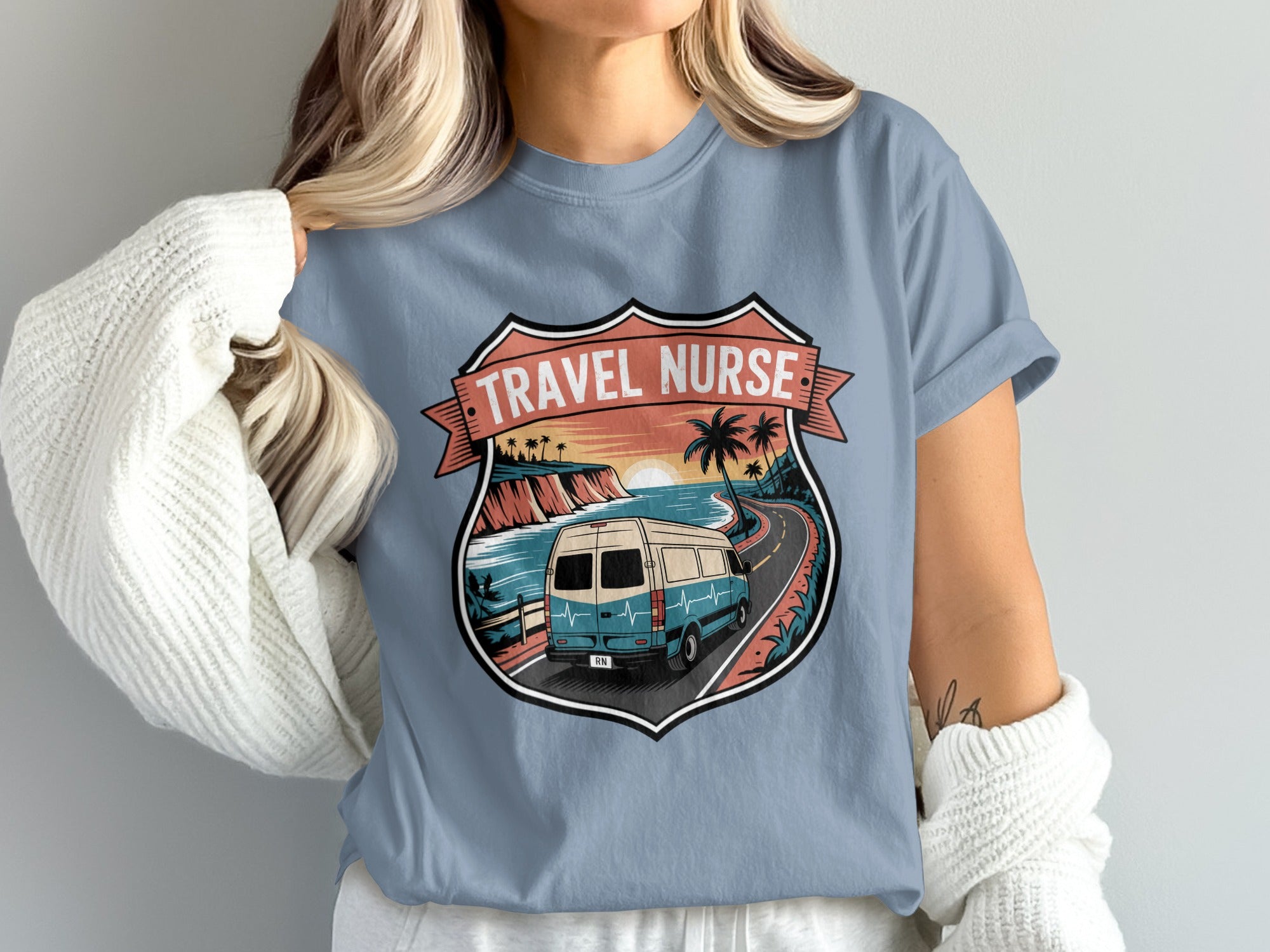 Van driving on scenic coastal road with "Travel Nurse" text on banner.
