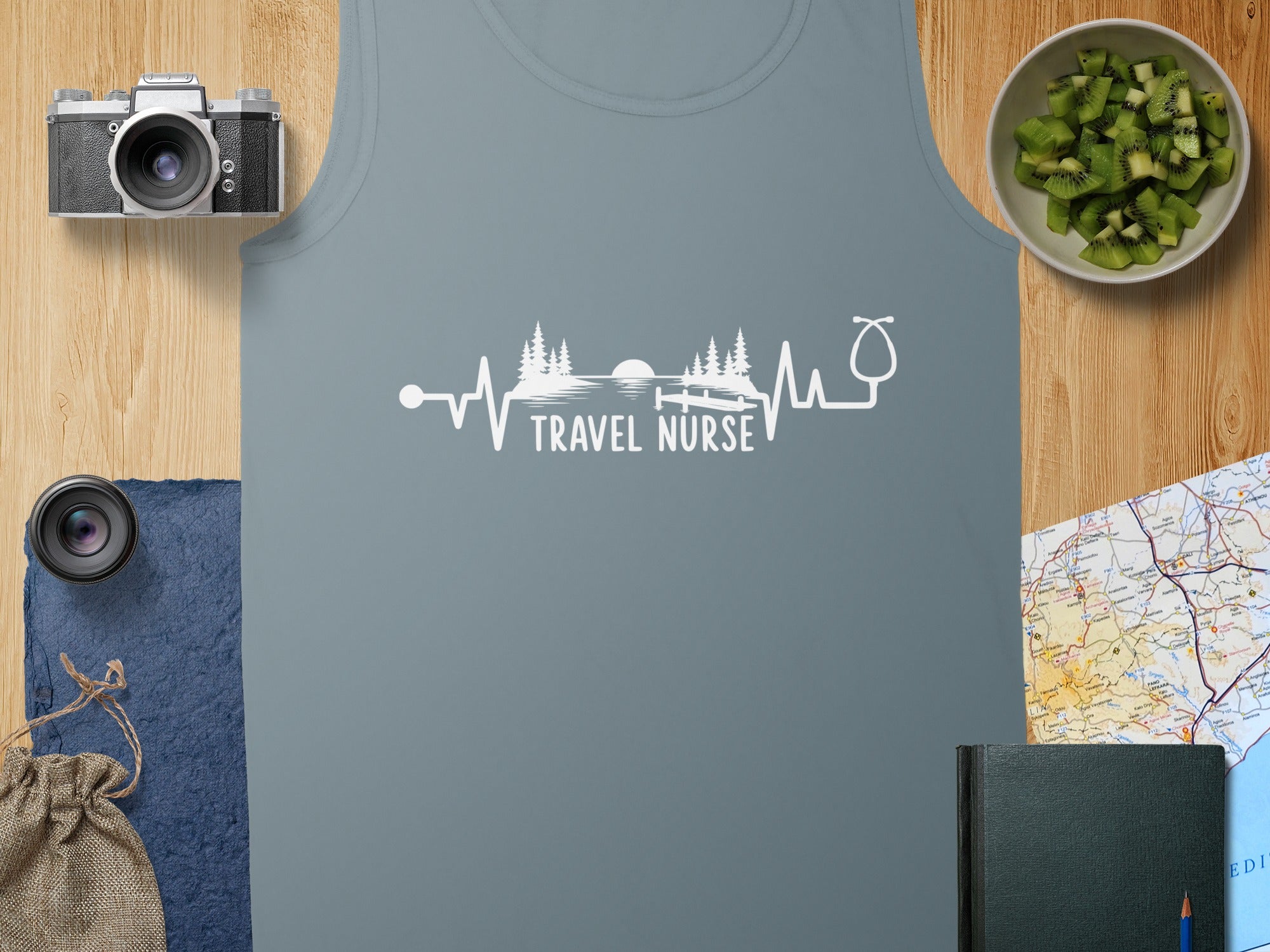 Gray tank top with "Travel Nurse" text and a heartbeat/tree graphic.