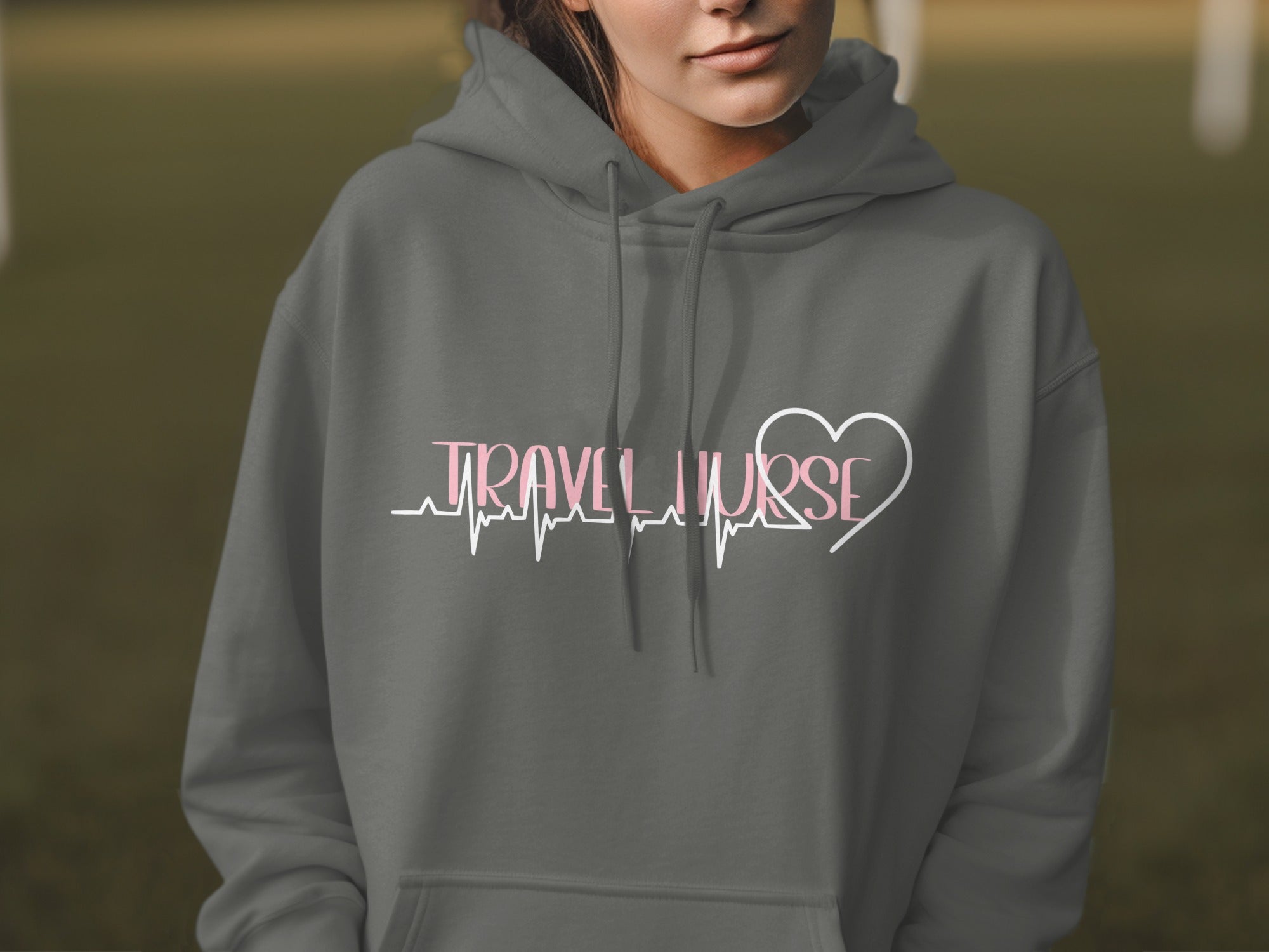Gray hoodie with "TRAVEL NURSE" and heart graphic on chest.