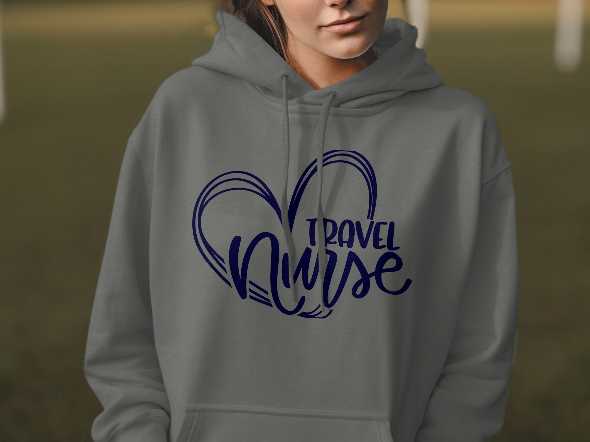 Grey hoodie with "Travel Nurse" text inside a heart outline.