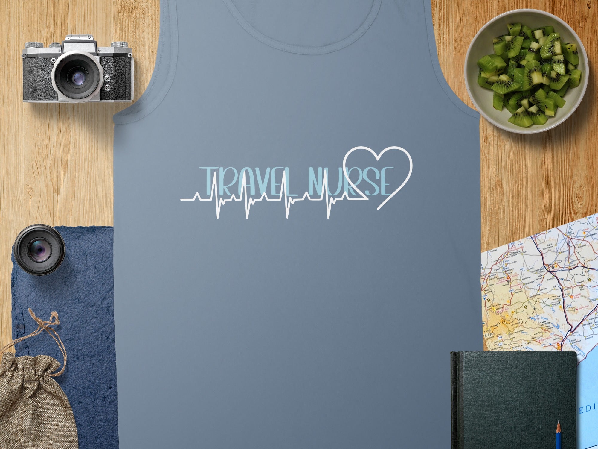 Gray tank top with "Travel Nurse" electrocardiogram heart logo.