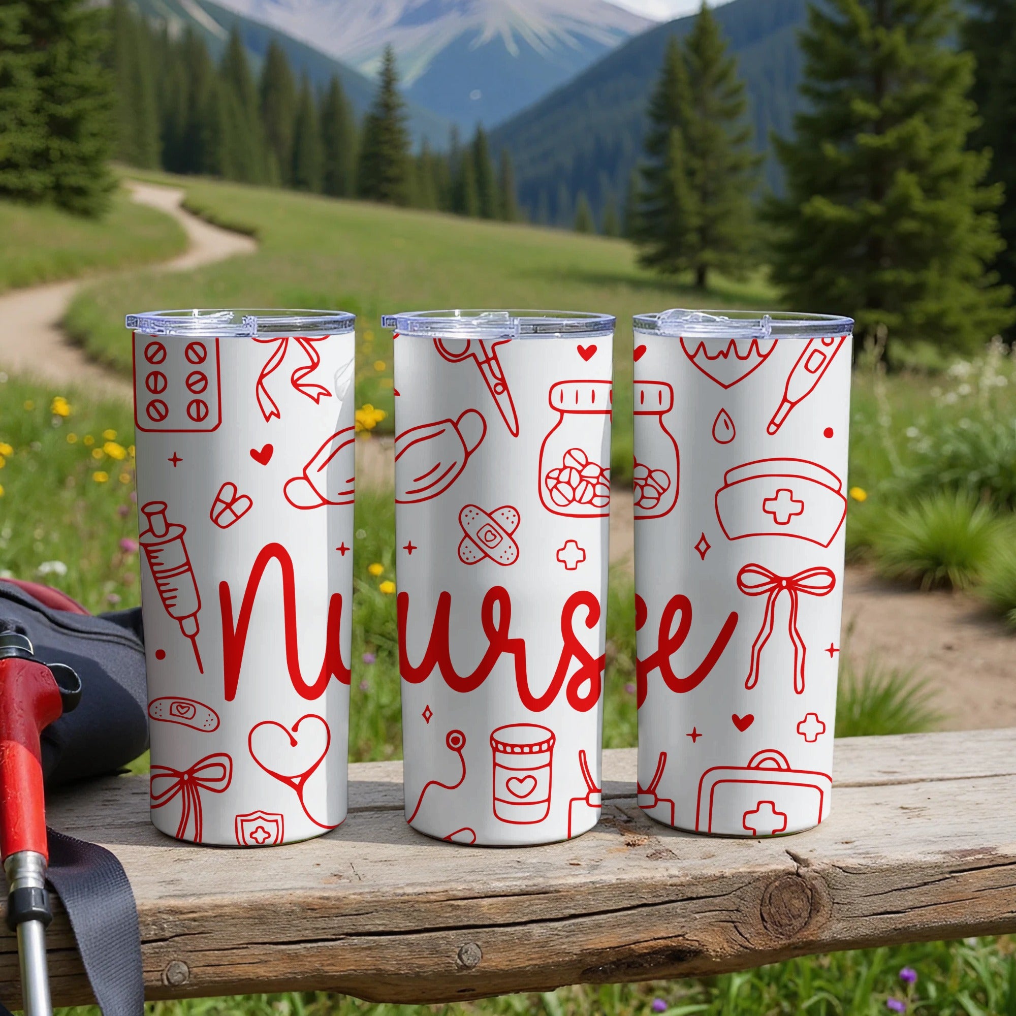 Three white tumblers with red nurse-themed drawings and the word "Nurse" stand on a wooden surface.