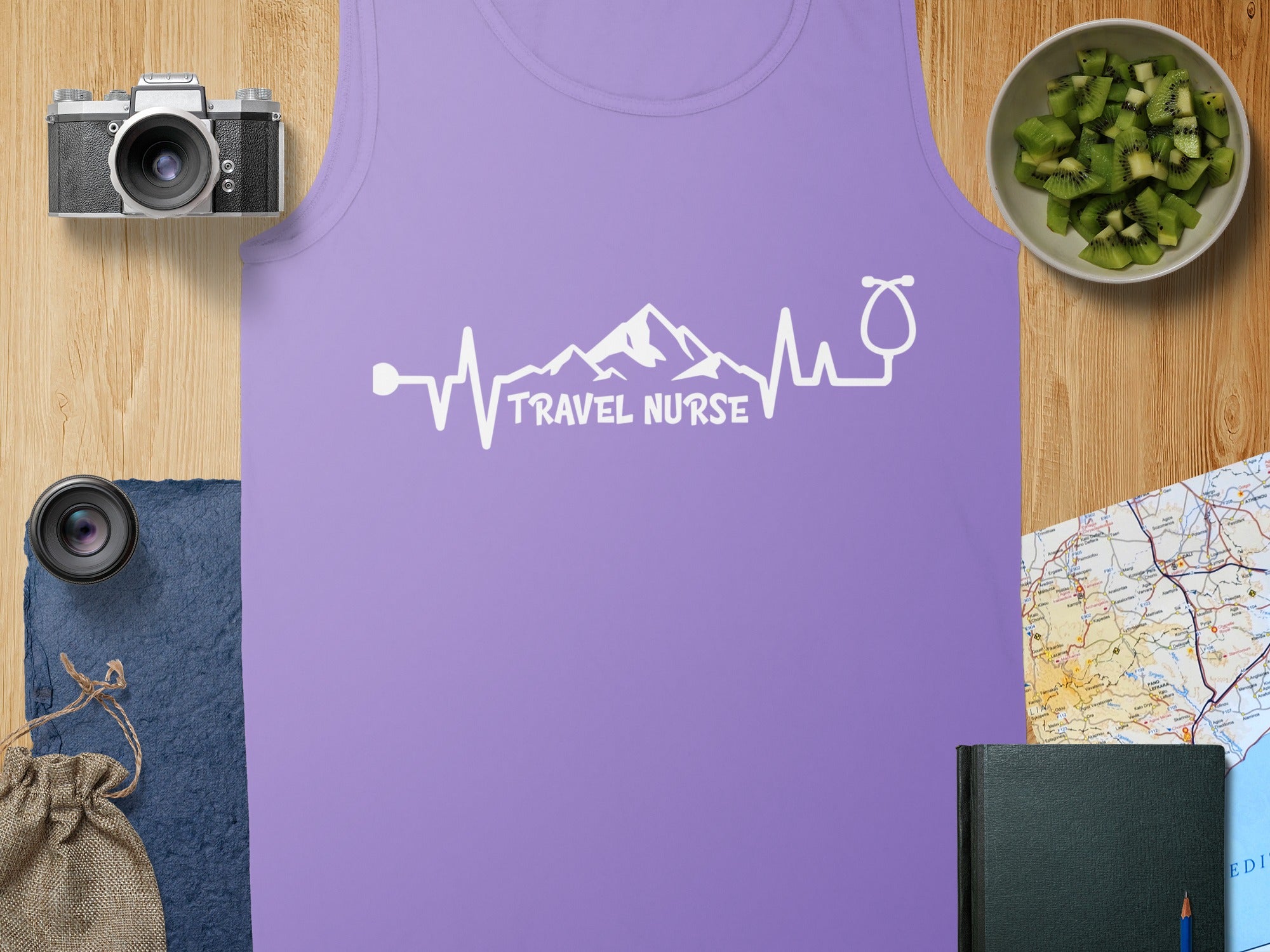 Purple tank top with "Travel Nurse" in a heartbeat and stethoscope design.