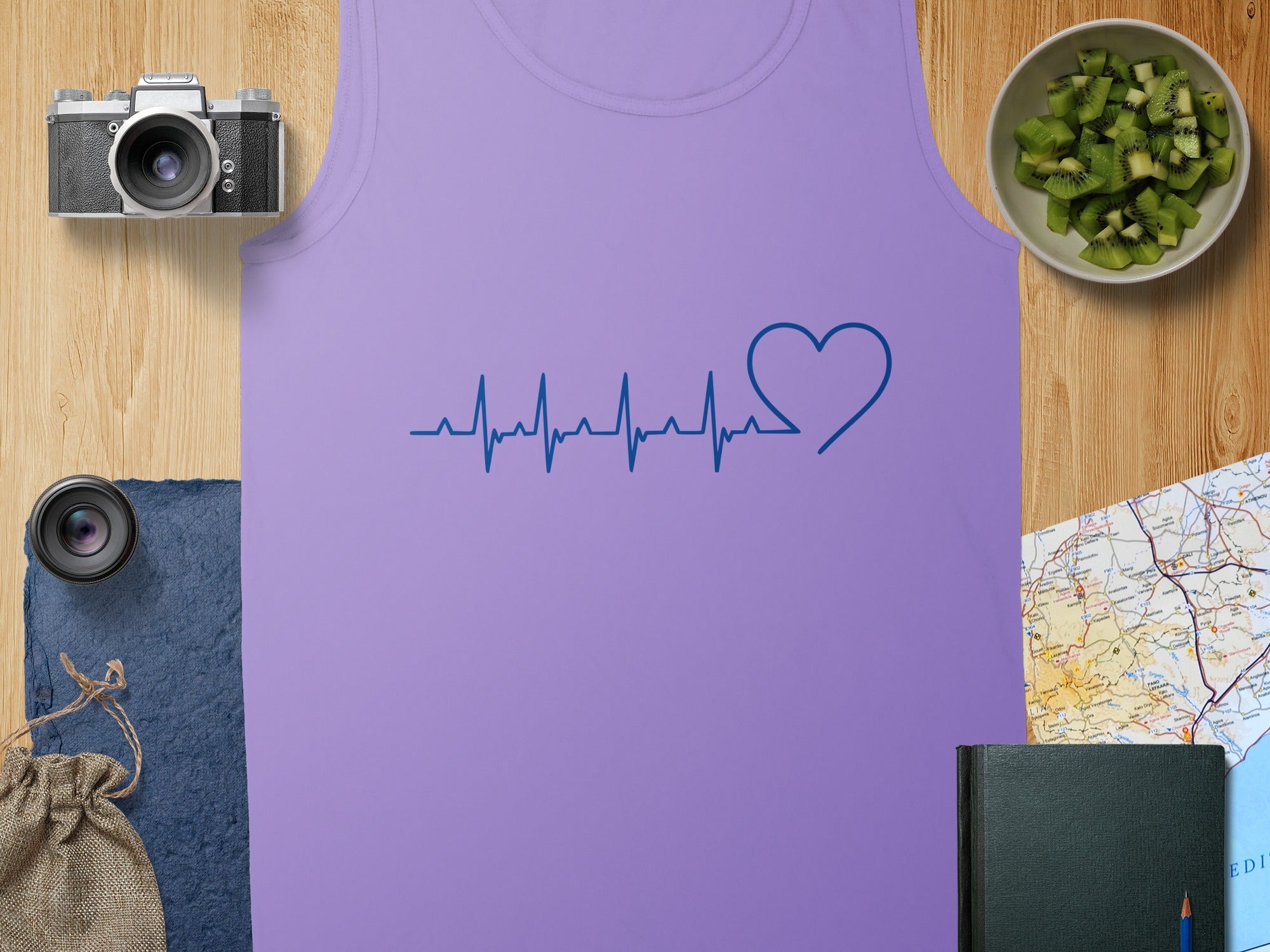Purple tank top with a blue electrocardiogram and heart graphic.