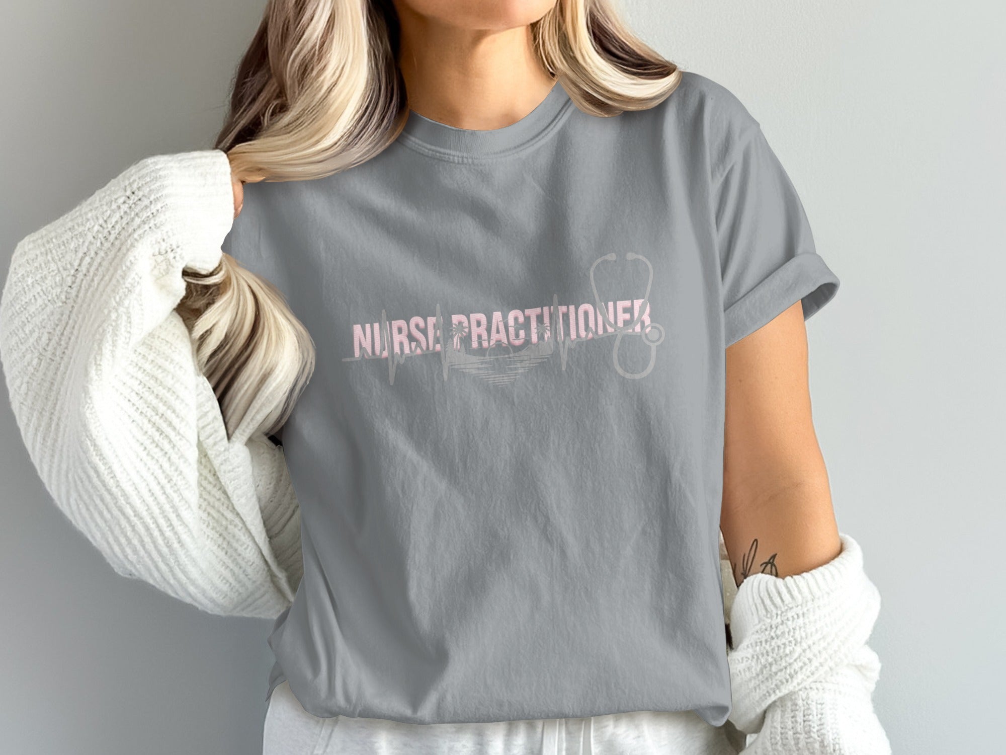 Gray t-shirt with "Nurse Practitioner" text and stethoscope design.