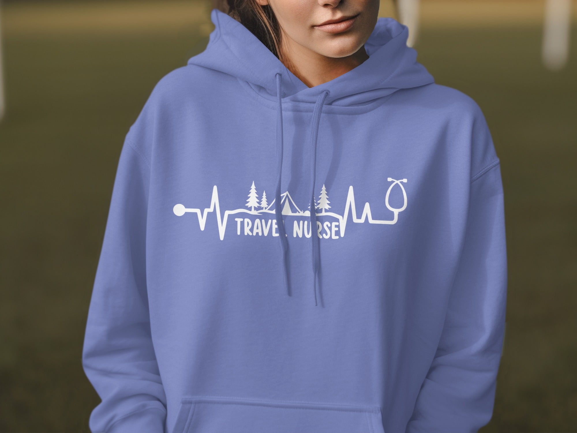 Purple hoodie with "TRAVEL NURSE" text and heartbeat design.