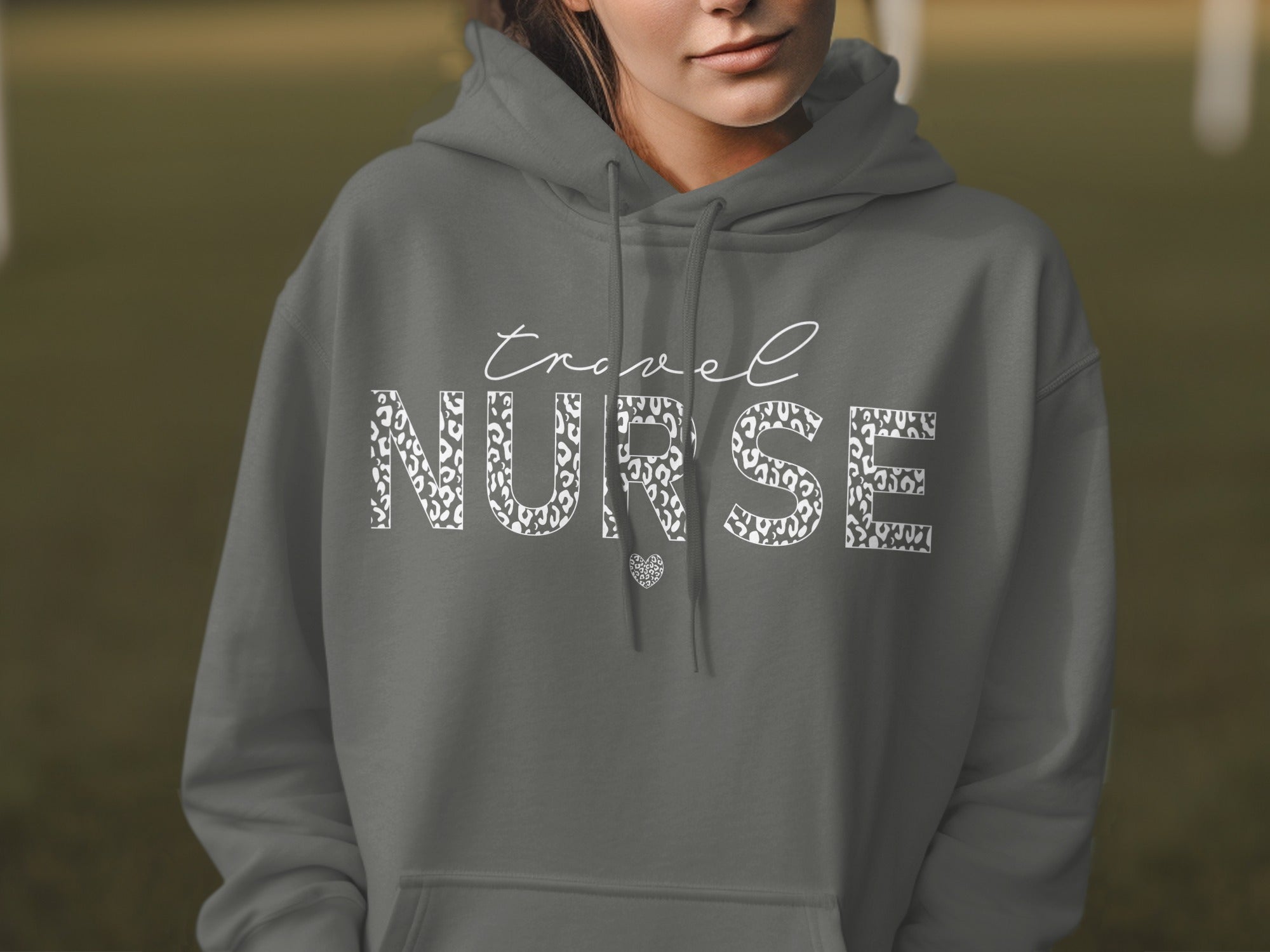 Gray hoodie with "Travel Nurse" text in leopard print font.