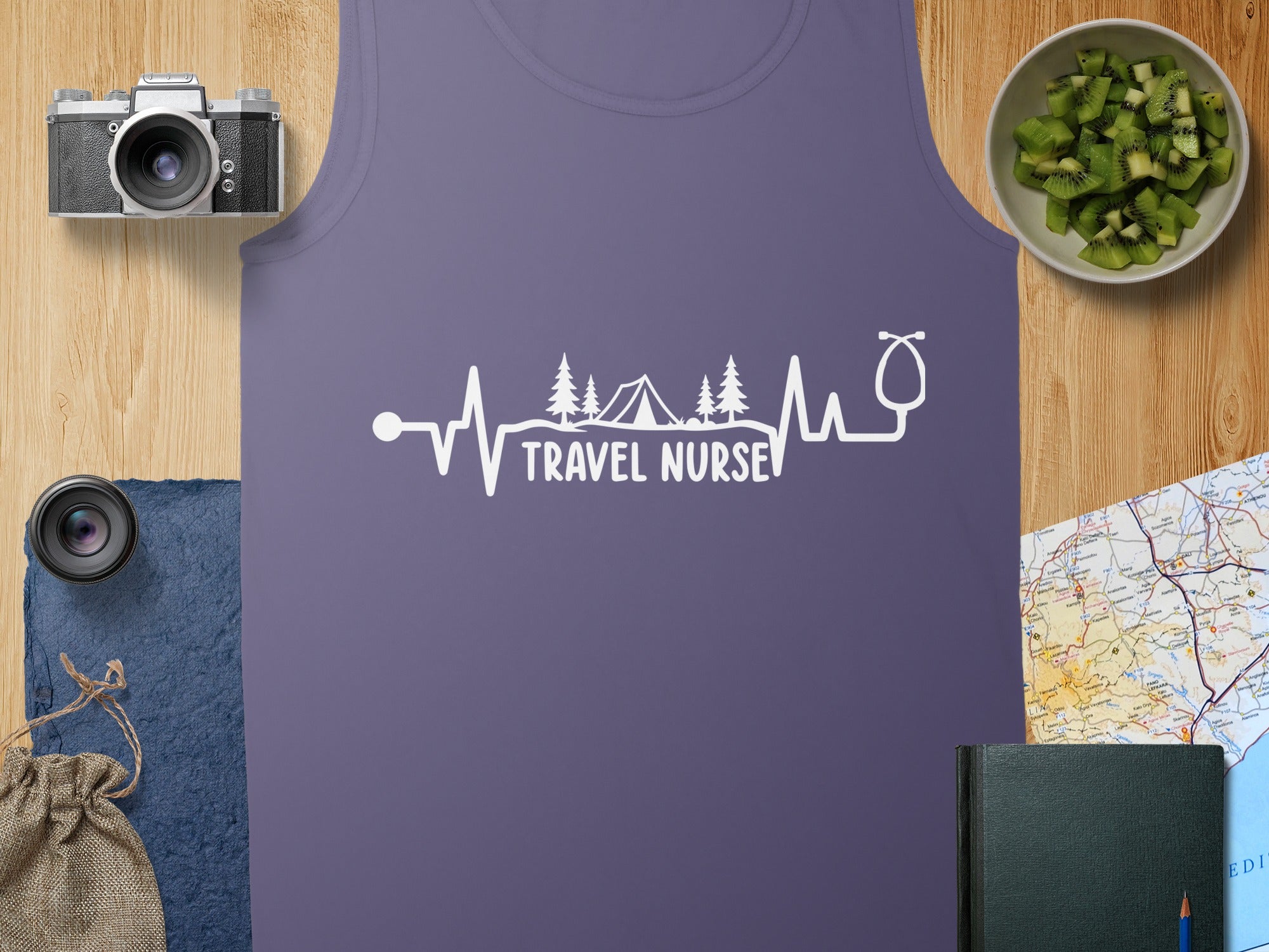 Purple tank top with "Travel Nurse" text and a heartbeat and camping graphic.