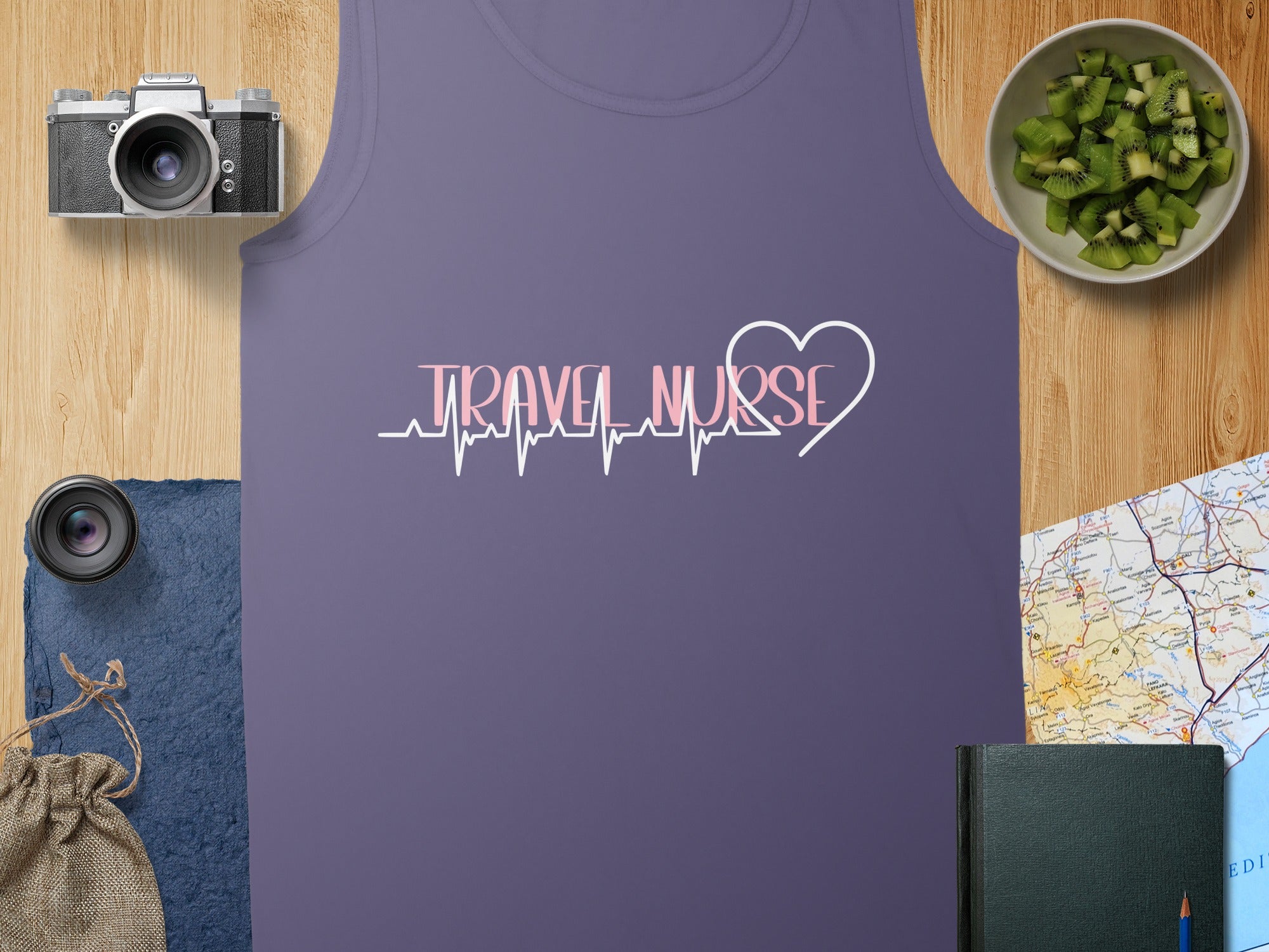 Purple tank top with "TRAVEL NURSE" in heartbeat graphic.