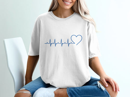 White t-shirt with blue heartbeat and heart graphic.