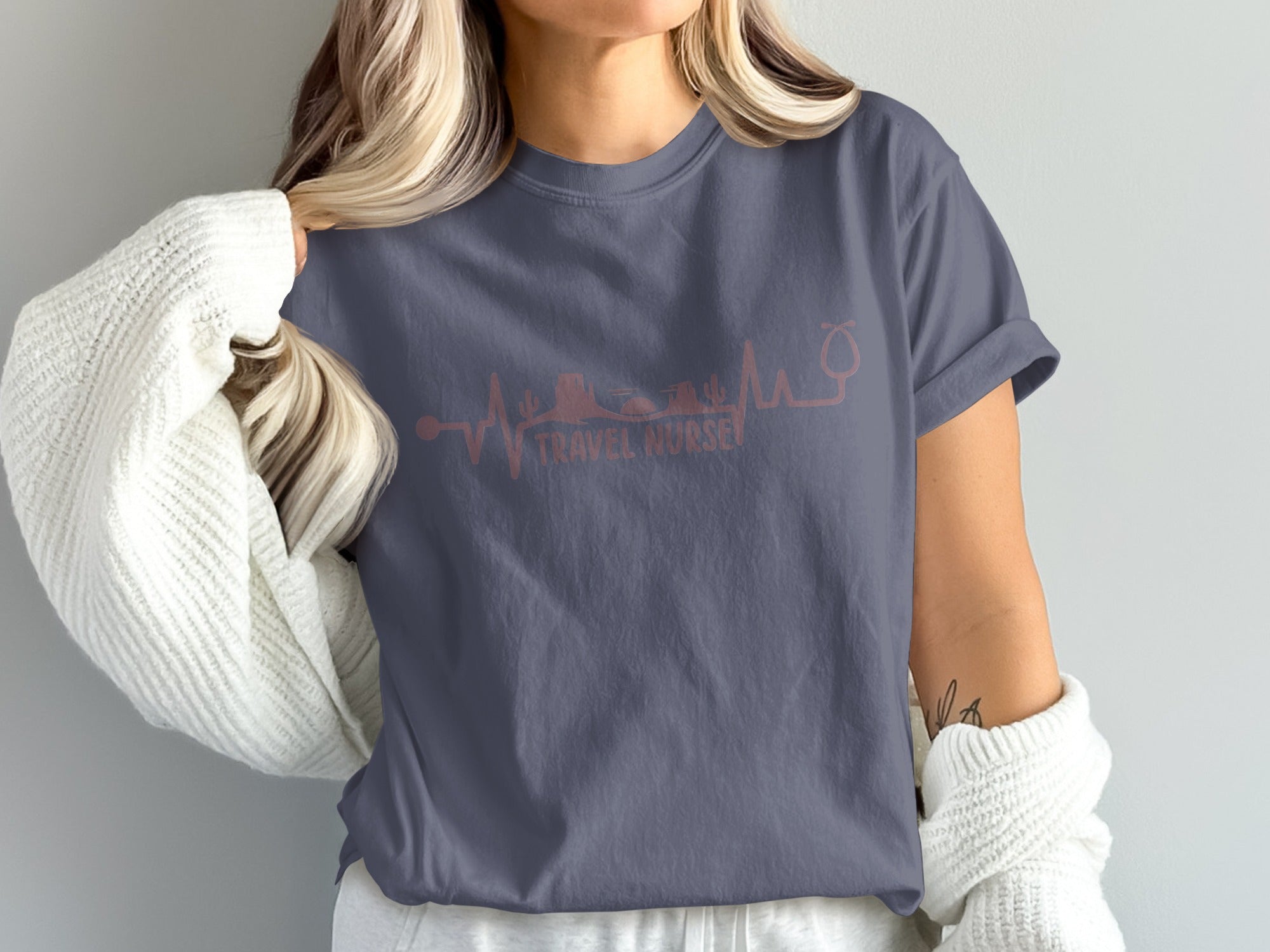 T-shirt with "Travel Nurse" heartbeat graphic featuring a stethoscope and desert scene.