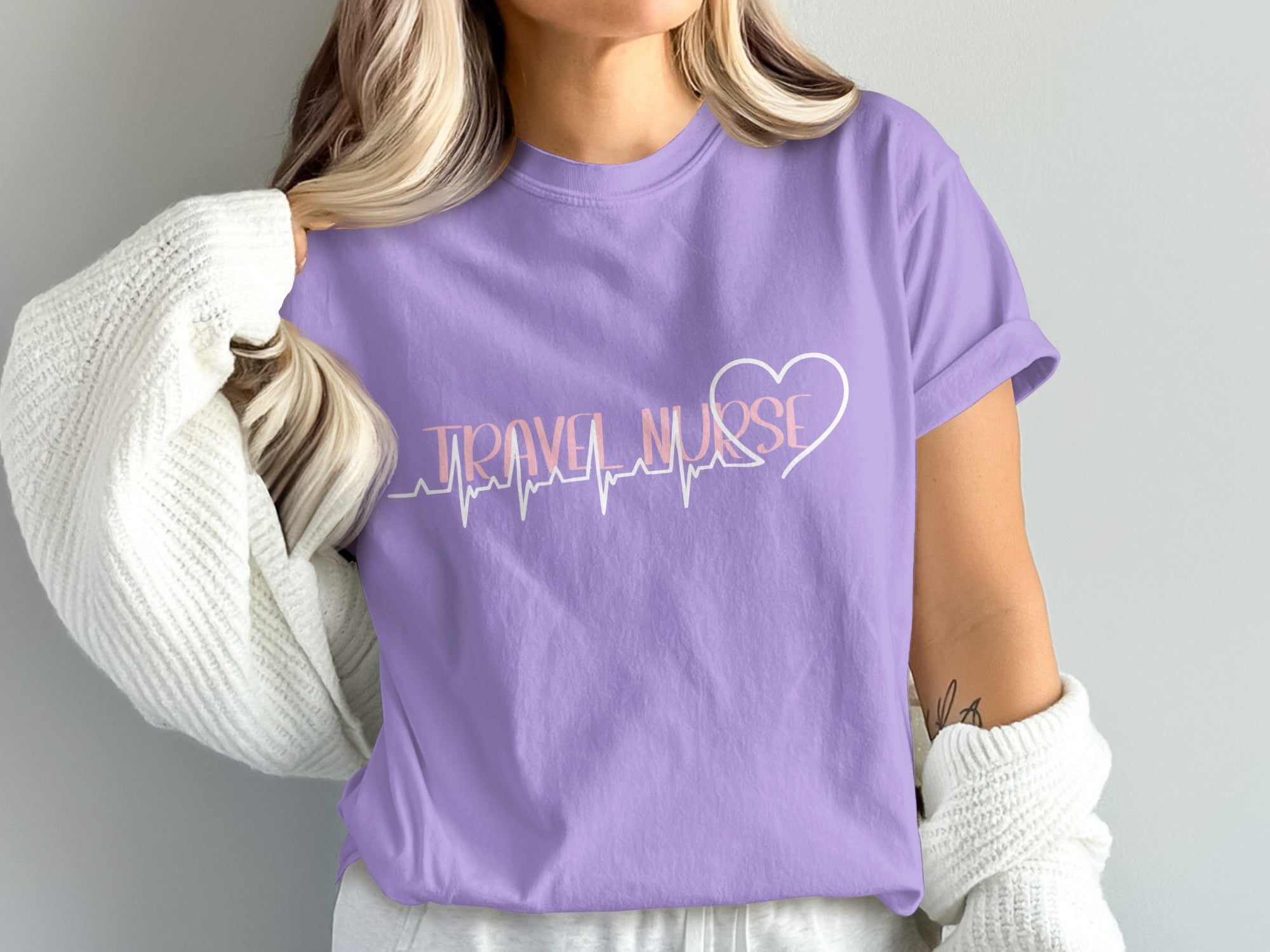 Lavender t-shirt with "Travel Nurse" and a heart-shaped ECG.