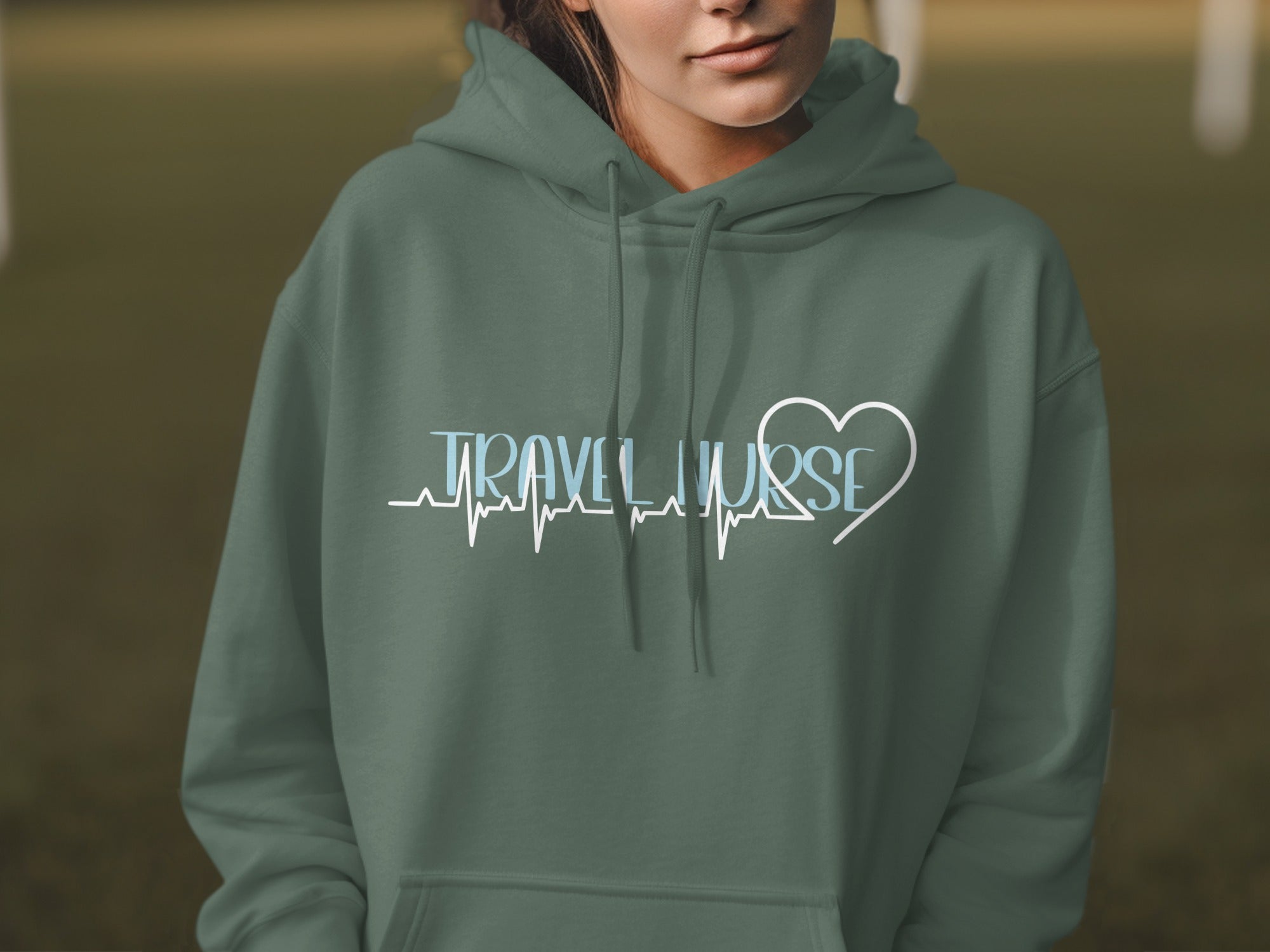 Green hoodie with "TRAVEL NURSE" text and a heart pulse design.