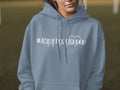 Blue hoodie with "Nurse Practitioner" text and heart rhythm graphic.