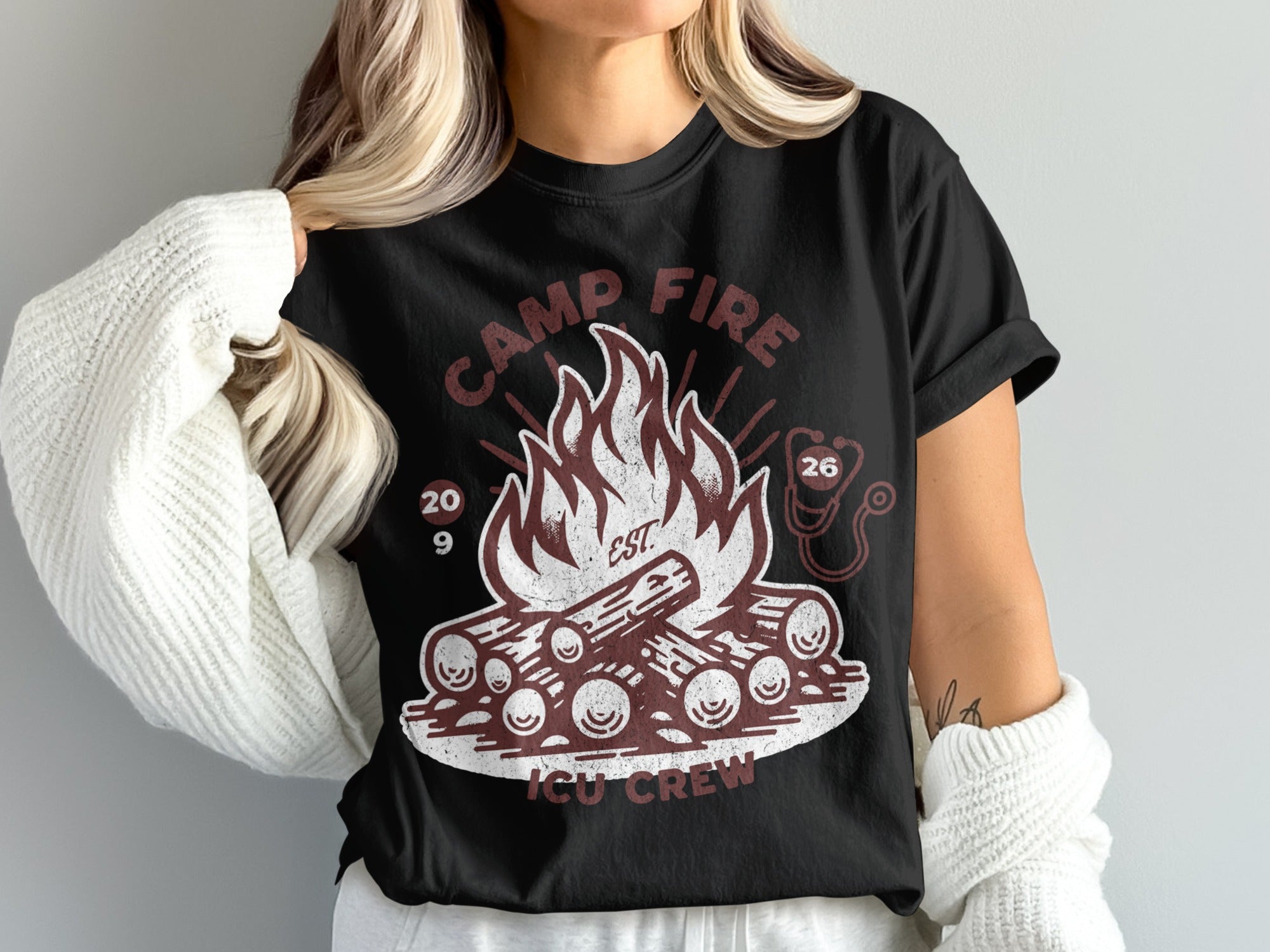 Black t-shirt with campfire and "Camp Fire ICU Crew" text.