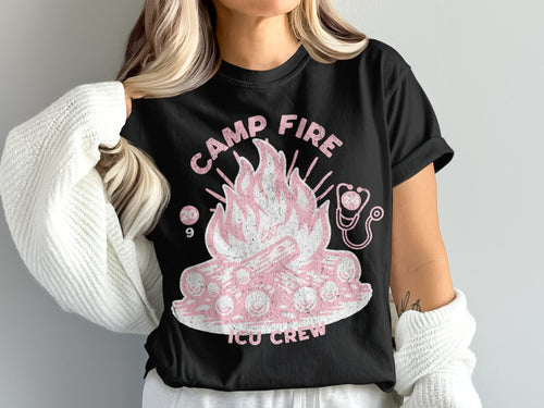 Black t-shirt with a pink campfire design and "Camp Fire ICU Crew" text.