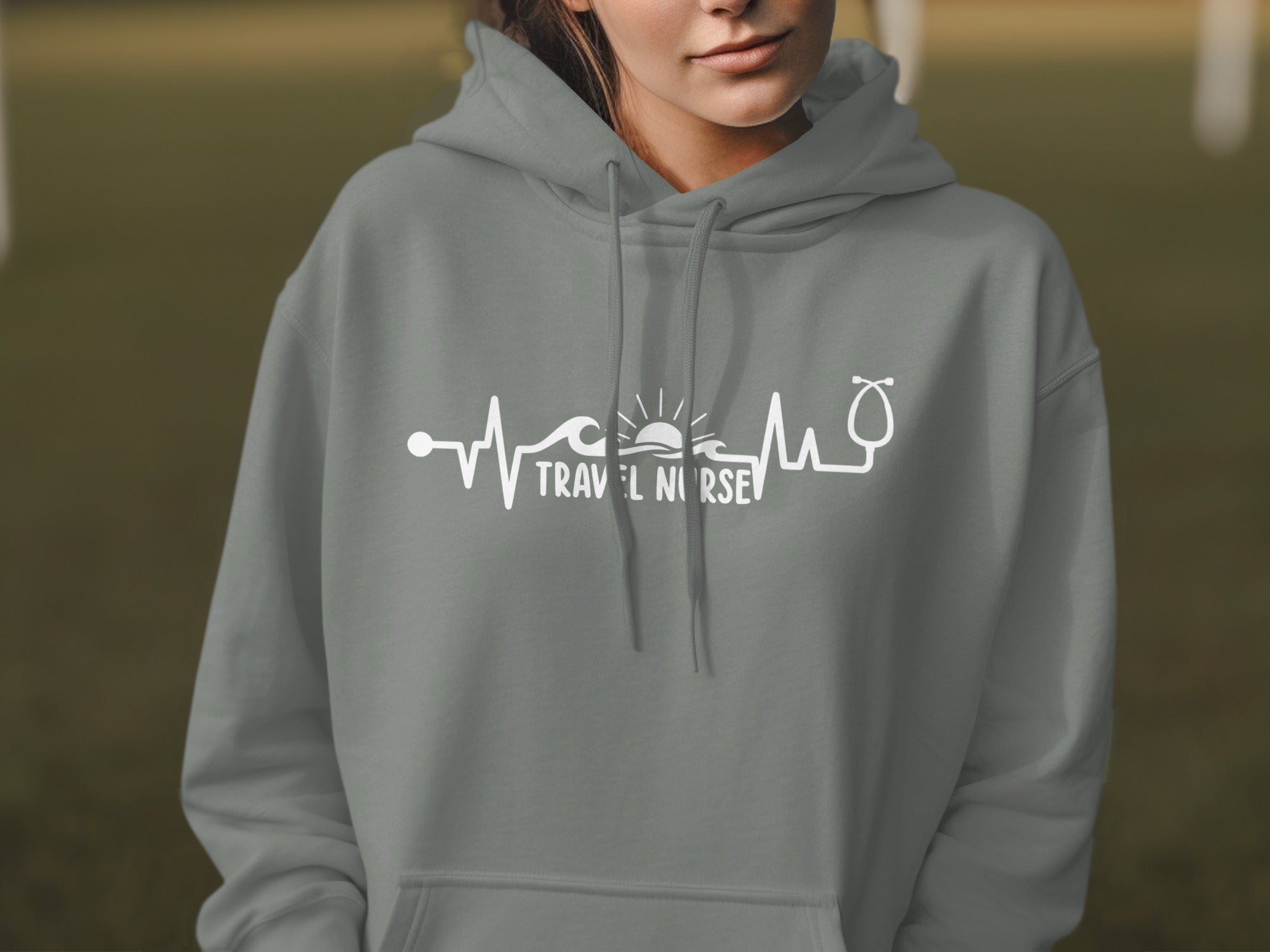 Gray hoodie with "Travel Nurse" and stethoscope heartbeat design.