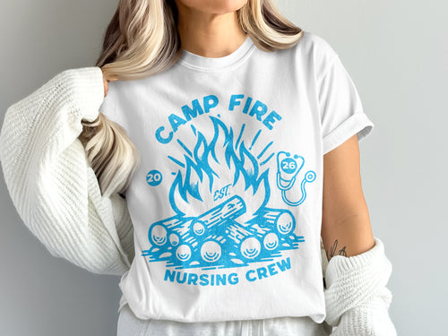 White t-shirt with "Camp Fire Nursing Crew" and campfire graphic.