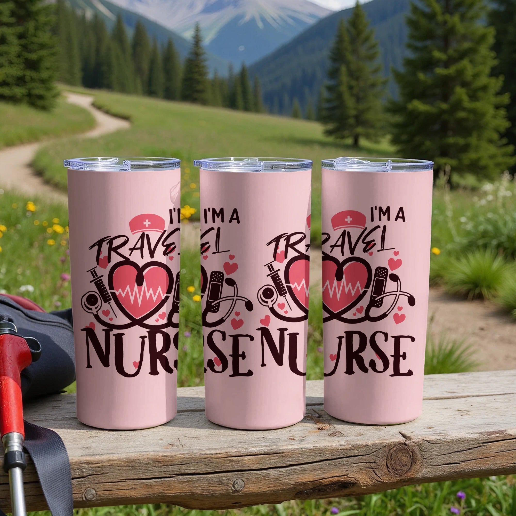 Three pink travel mugs with "I'm a Travel Nurse" text and medical symbols.