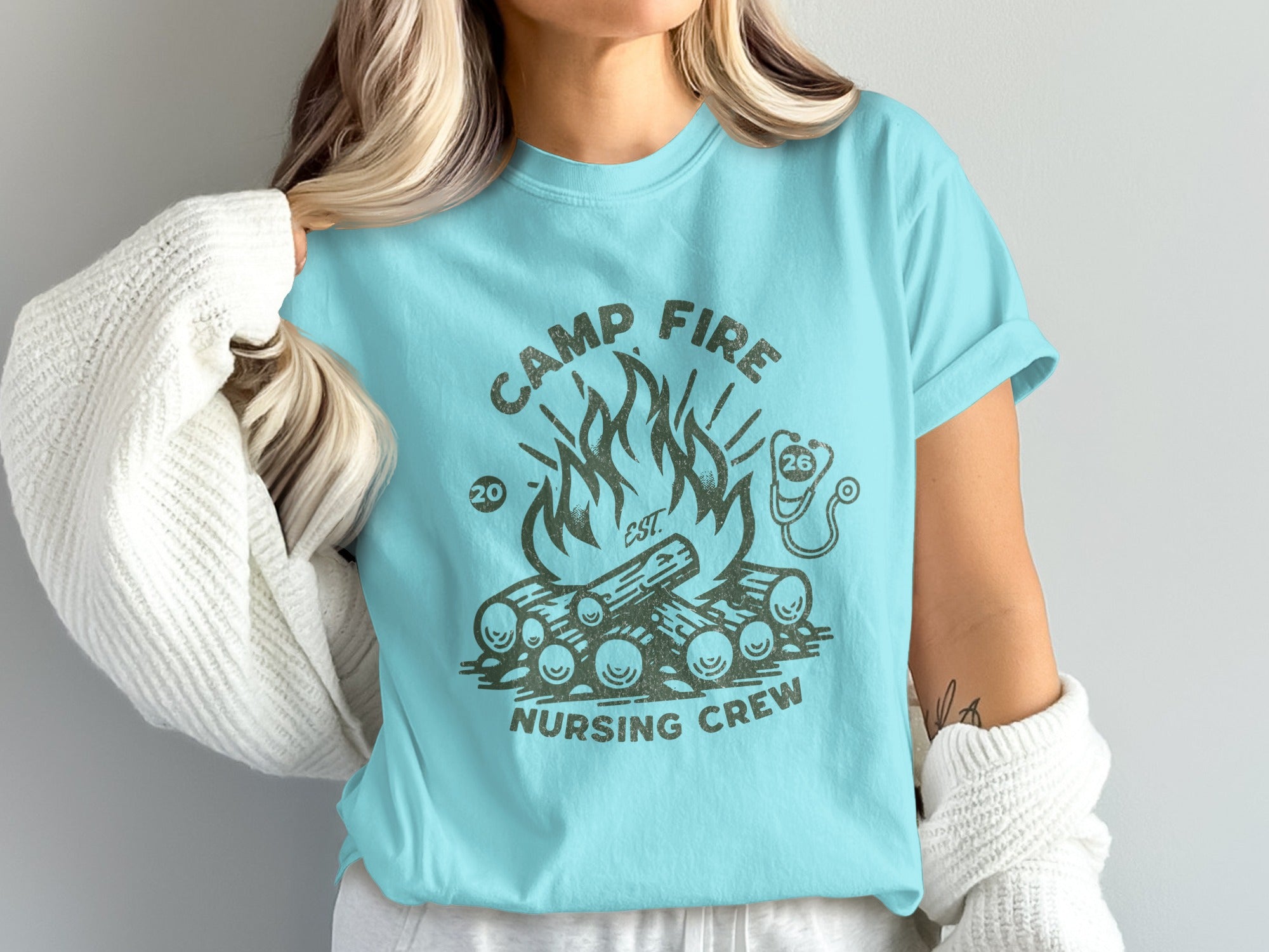 Camp Fire Nursing Crew t-shirt with campfire and stethoscope graphic.