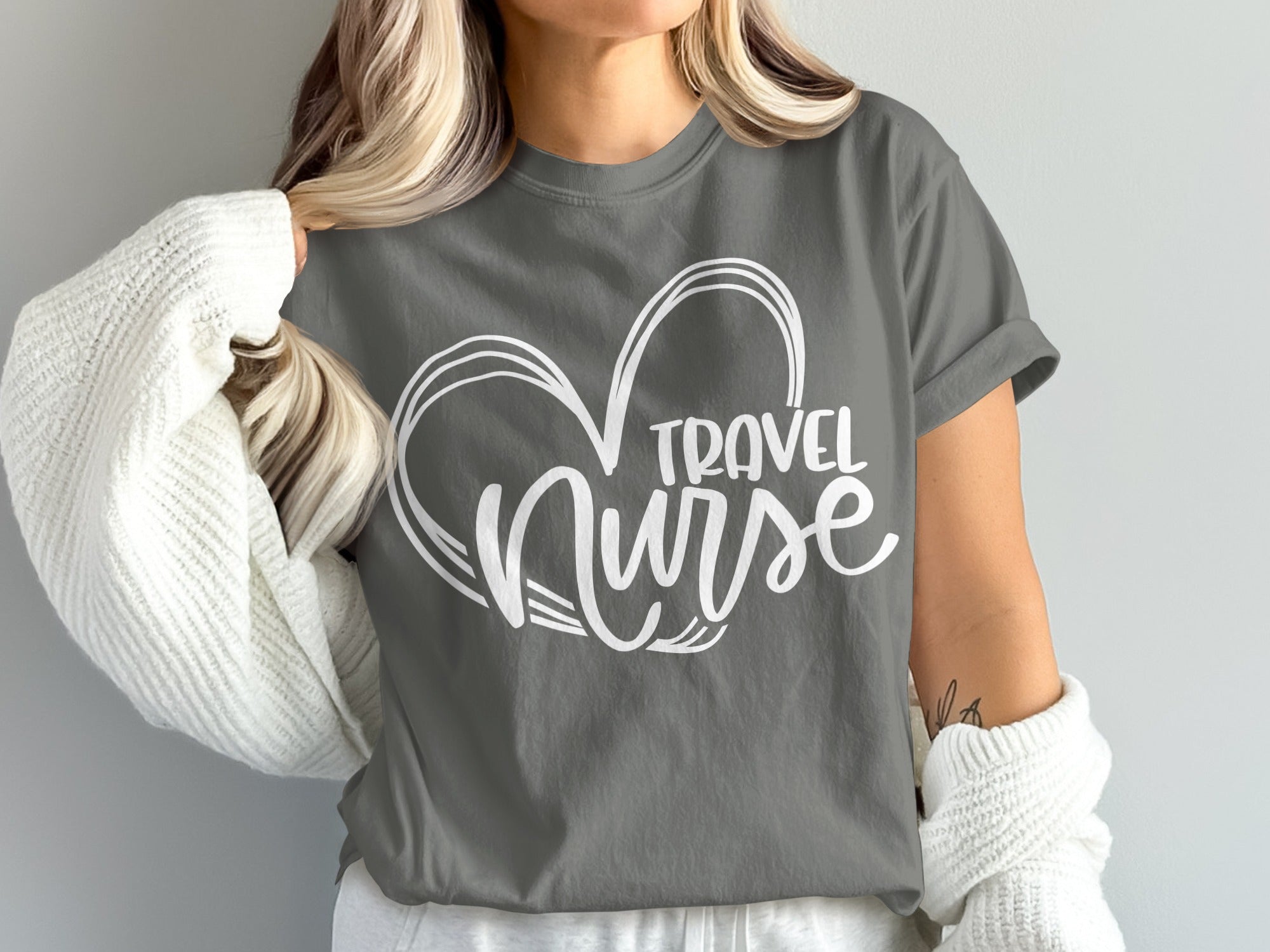 Gray t-shirt with white "Travel Nurse" heart graphic.