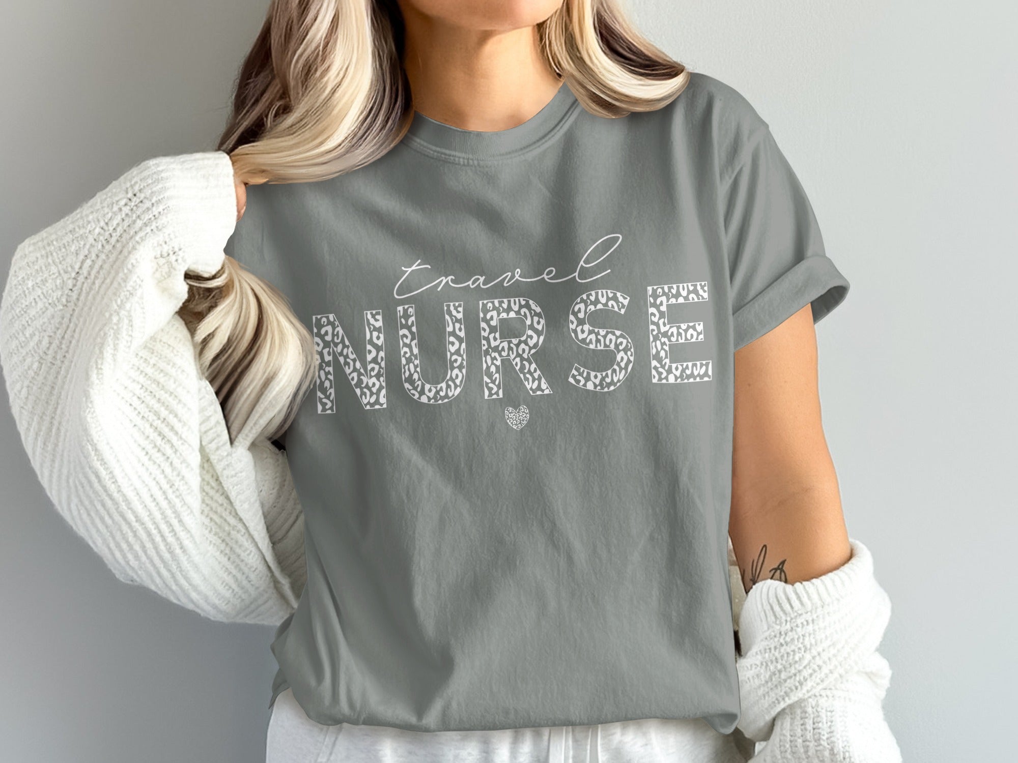 Gray t-shirt with "travel NURSE" text and leopard print letters.