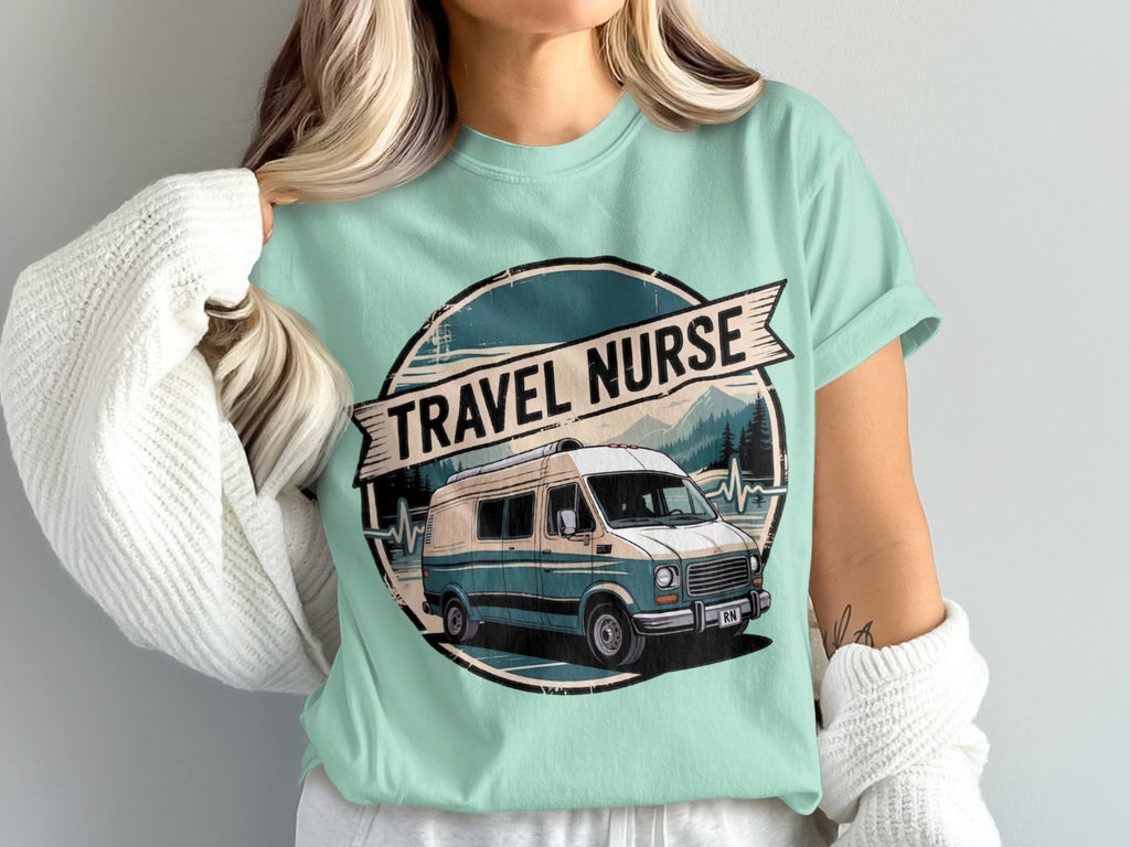 Turquoise t-shirt featuring a vintage camper van and mountains graphic.