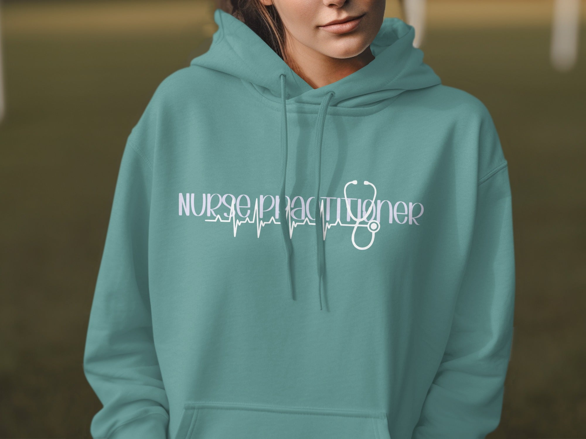 Teal hoodie with "nurse practitioner" and stethoscope design.