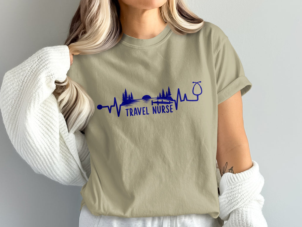 Tan t-shirt with "Travel Nurse" text and a landscape heartbeat design.