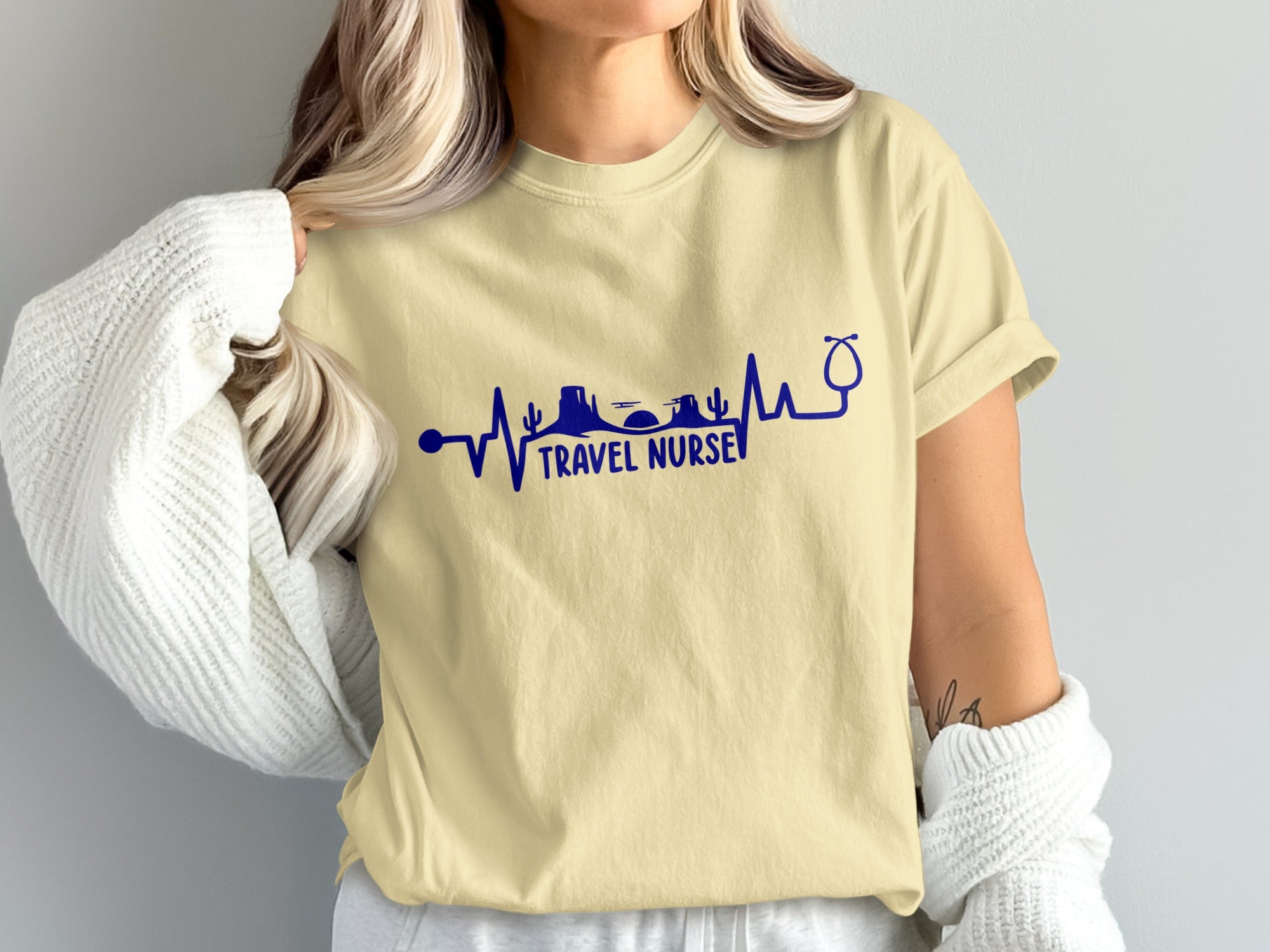 Light yellow t-shirt with "Travel Nurse" and heartbeat graphic.