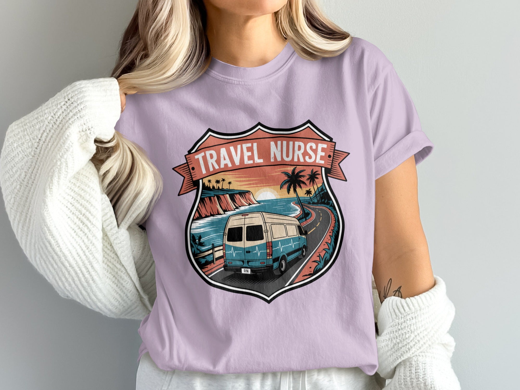 Travel nurse t-shirt with van on scenic coastal road and palm trees.