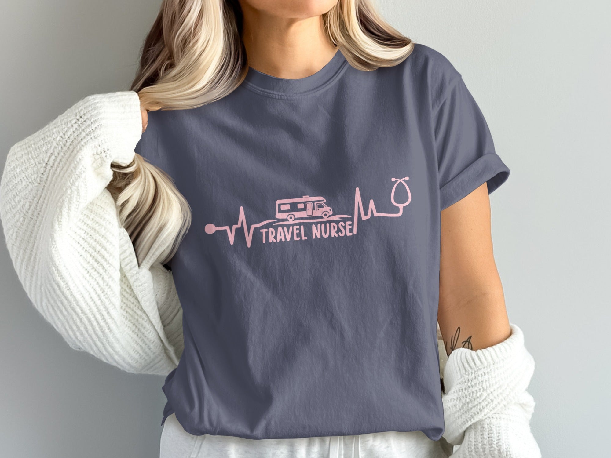 T-shirt with pink stethoscope heartbeat line and RV, text "TRAVEL NURSE".
