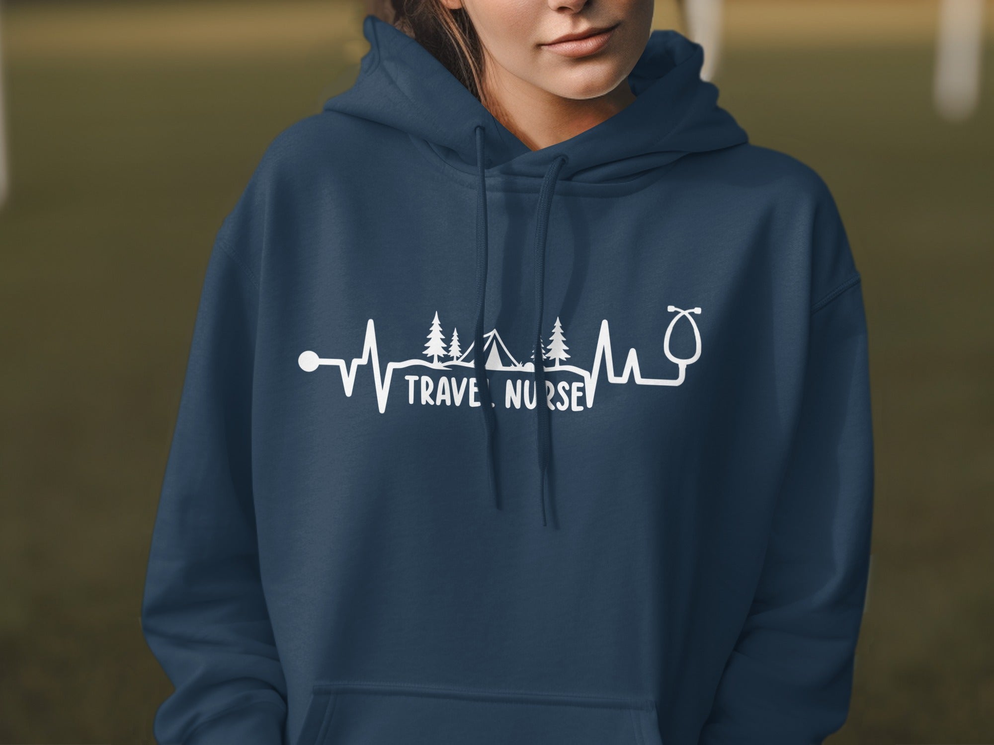 Navy hoodie with "Travel Nurse" stethoscope and heartbeat graphic.