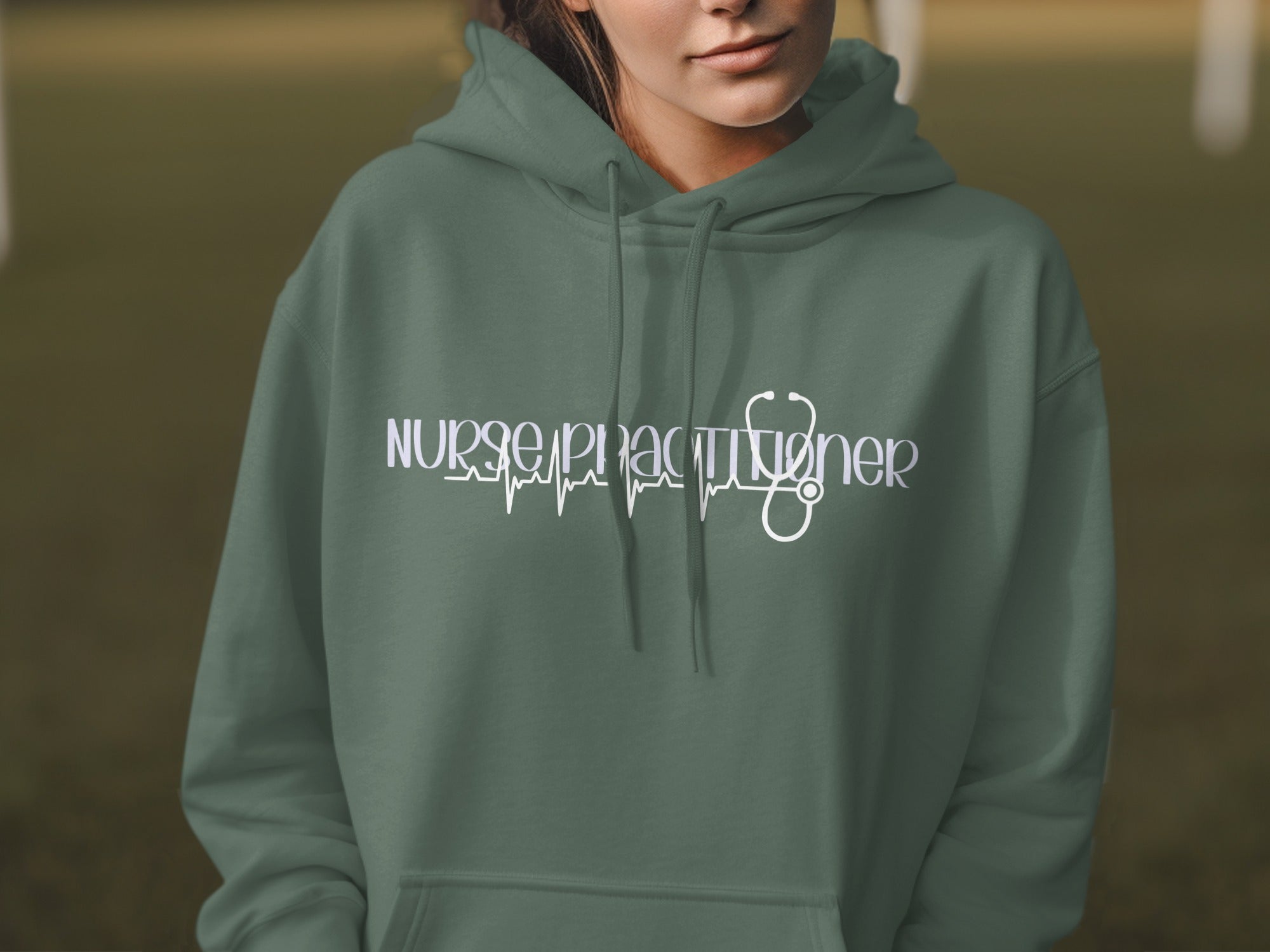 Green hoodie with "Nurse Practitioner" and stethoscope graphic.
