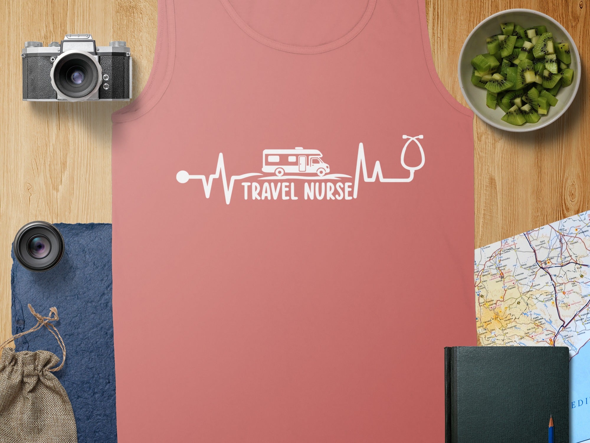 Coral tank top with "TRAVEL NURSE" and a heartbeat design.